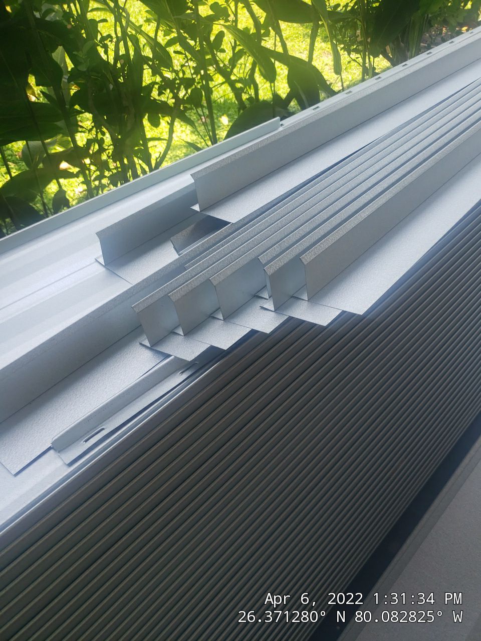 Residential Roofing Installation using 1" Nail strip metal roof by BLUES BROTHERS CONSTRUCTION CORP