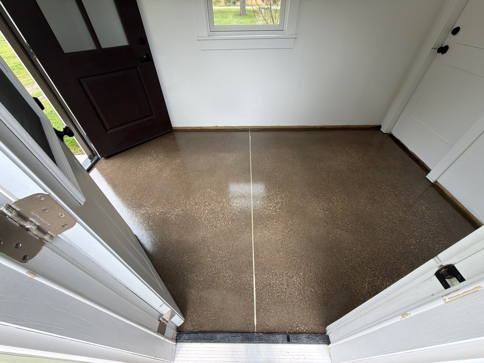 Speckled Epoxy Floor Installation and Concrete Refinishing in Nunica by Gordon Painting