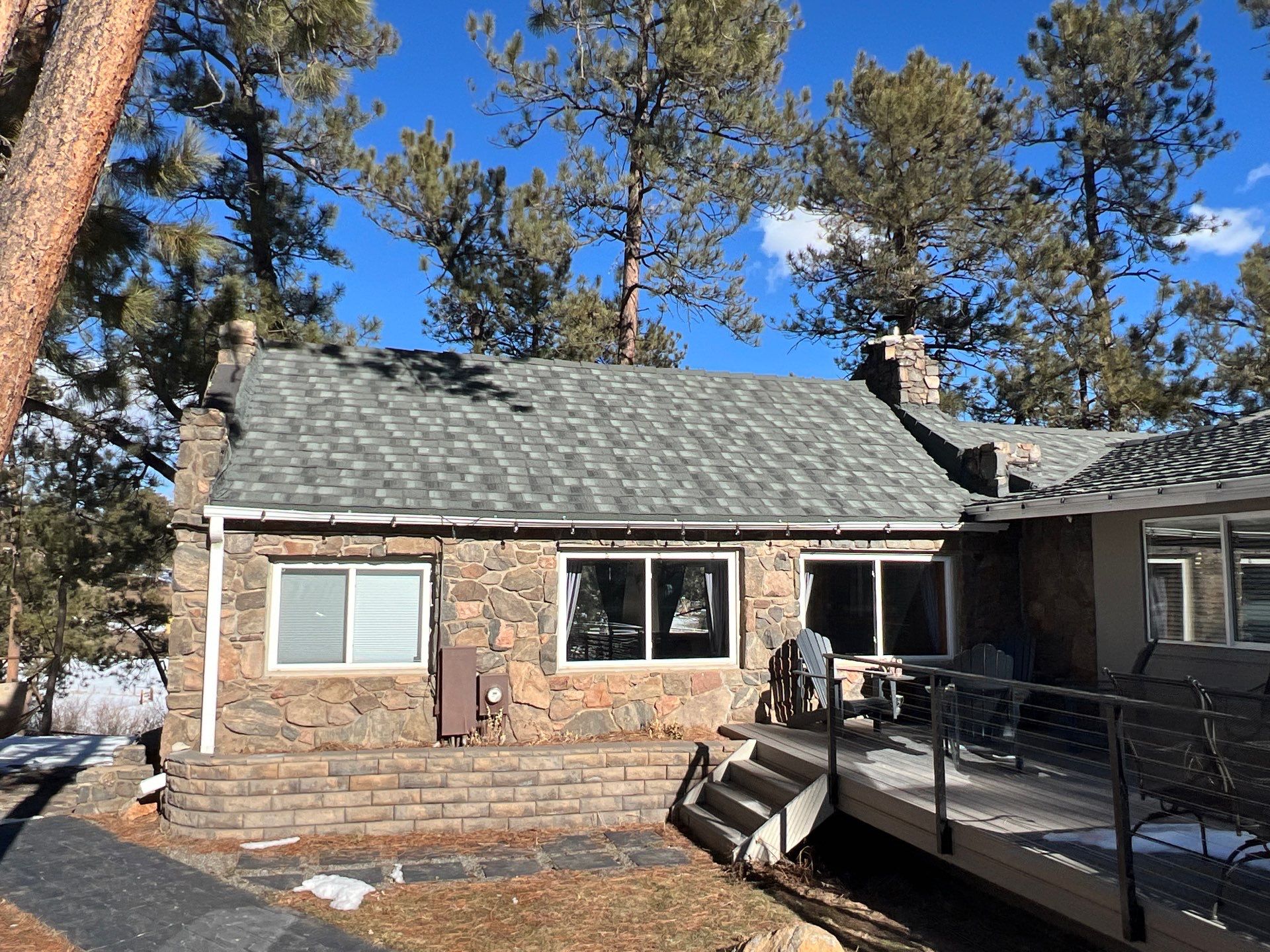 Residential Roofing Installation using Stone Coated Steel by Blue Peaks Roofing LLC 