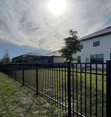 Aluminum Fence Installation using Black 3 Rail Aluminum Fence