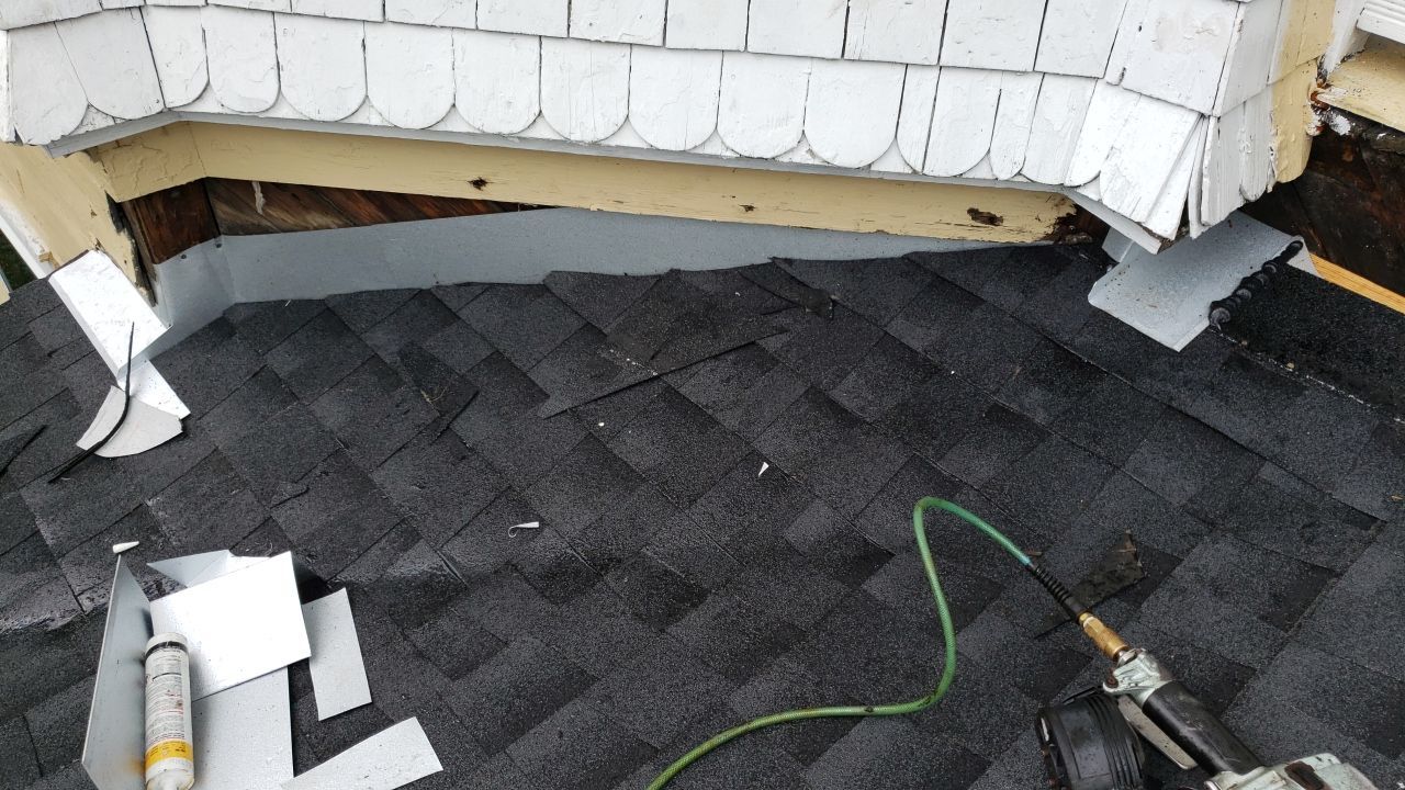 Residential Roofing Installation using Roof Replacement by American Roofing & Construction LLC