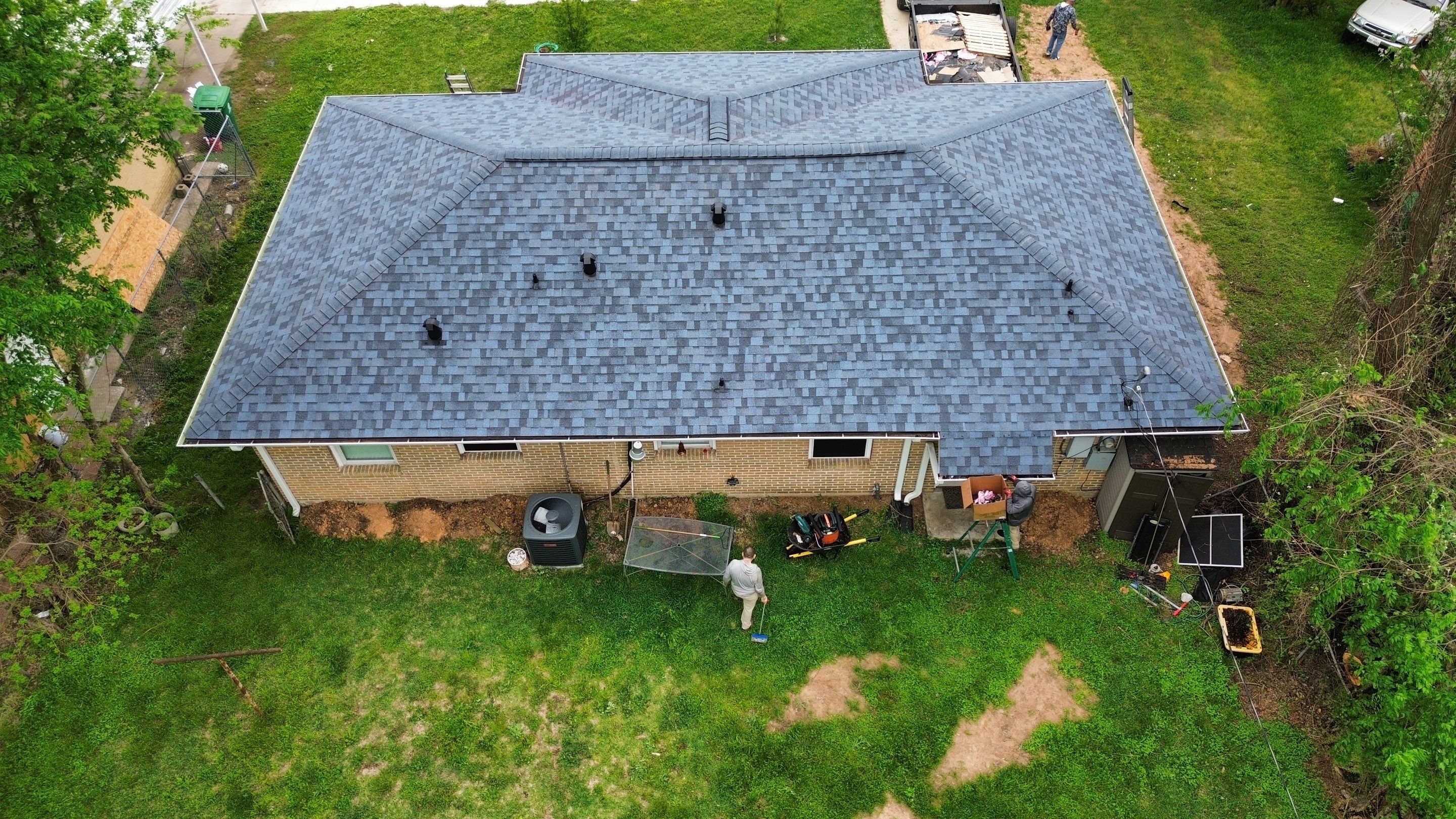 Houston Residential Roof Replacement Using Harbor Blue Architectural Shingles by Houston Roofing & Construction