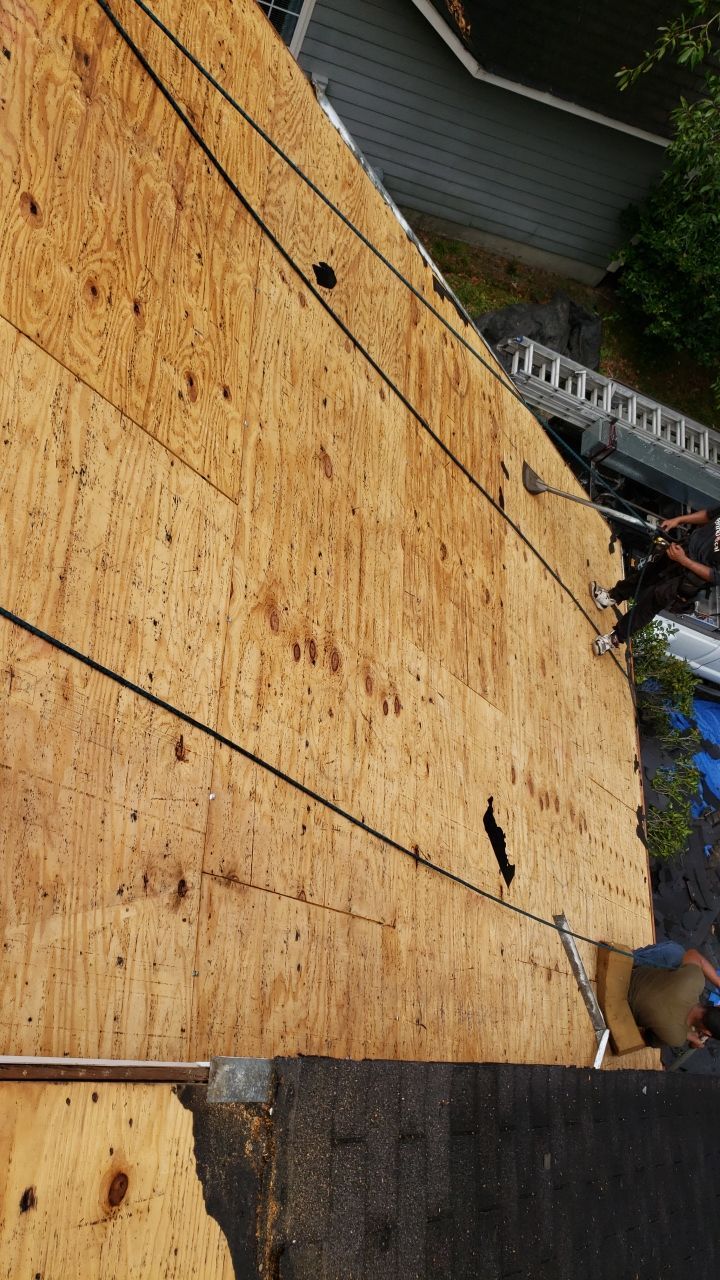 Residential Roofing Installation using Roof Replacement by American Roofing & Construction LLC