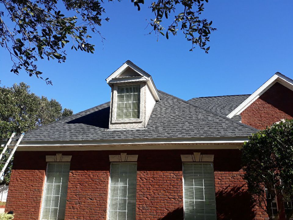 Residential Roofing Installation using Roof Replacement by American Roofing & Construction LLC