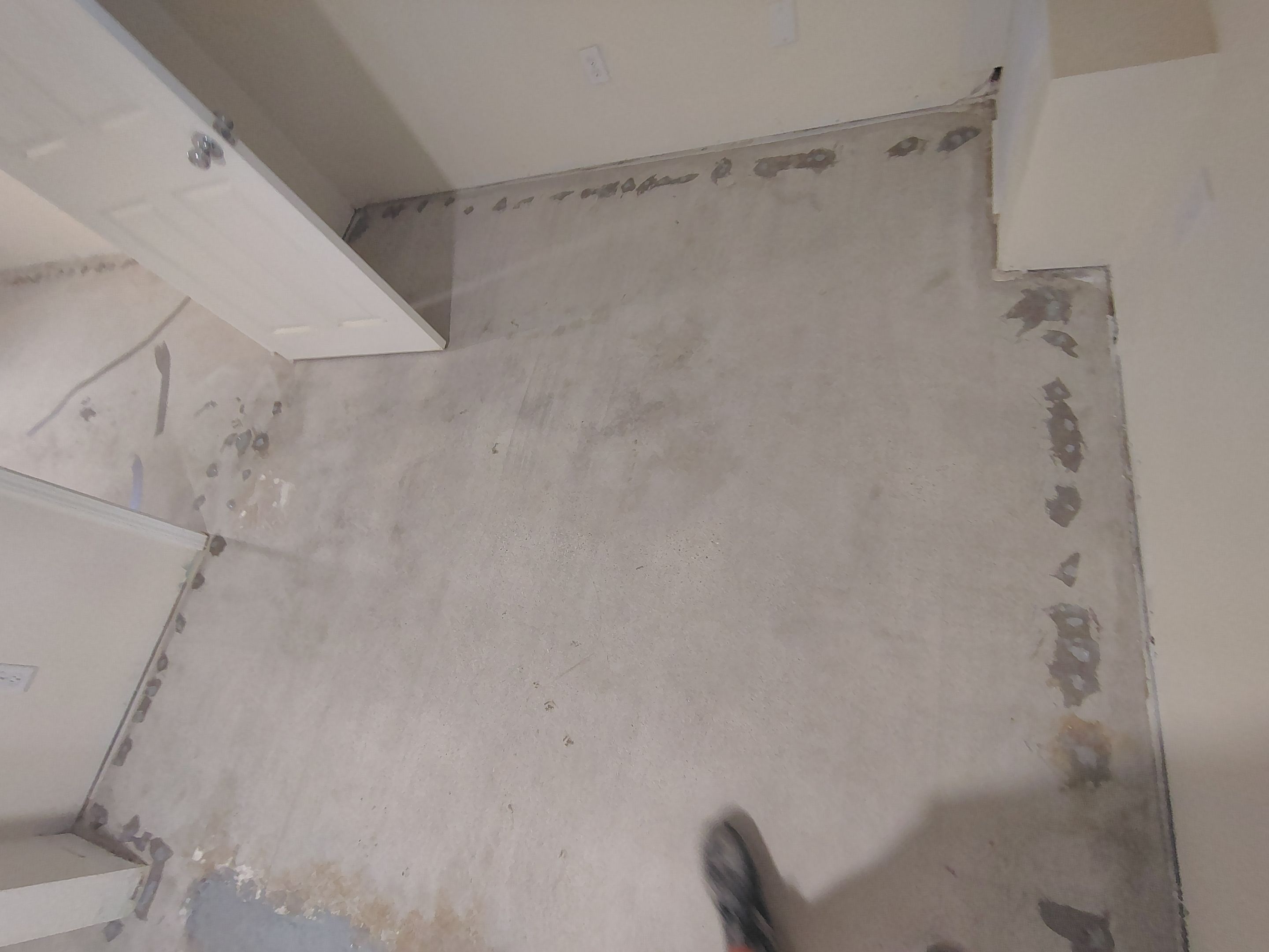 Comprehensive Basement Concrete Floor Coating and Crack Repair in Sioux Falls by Select Painting, Coatings & Garage Cabinets