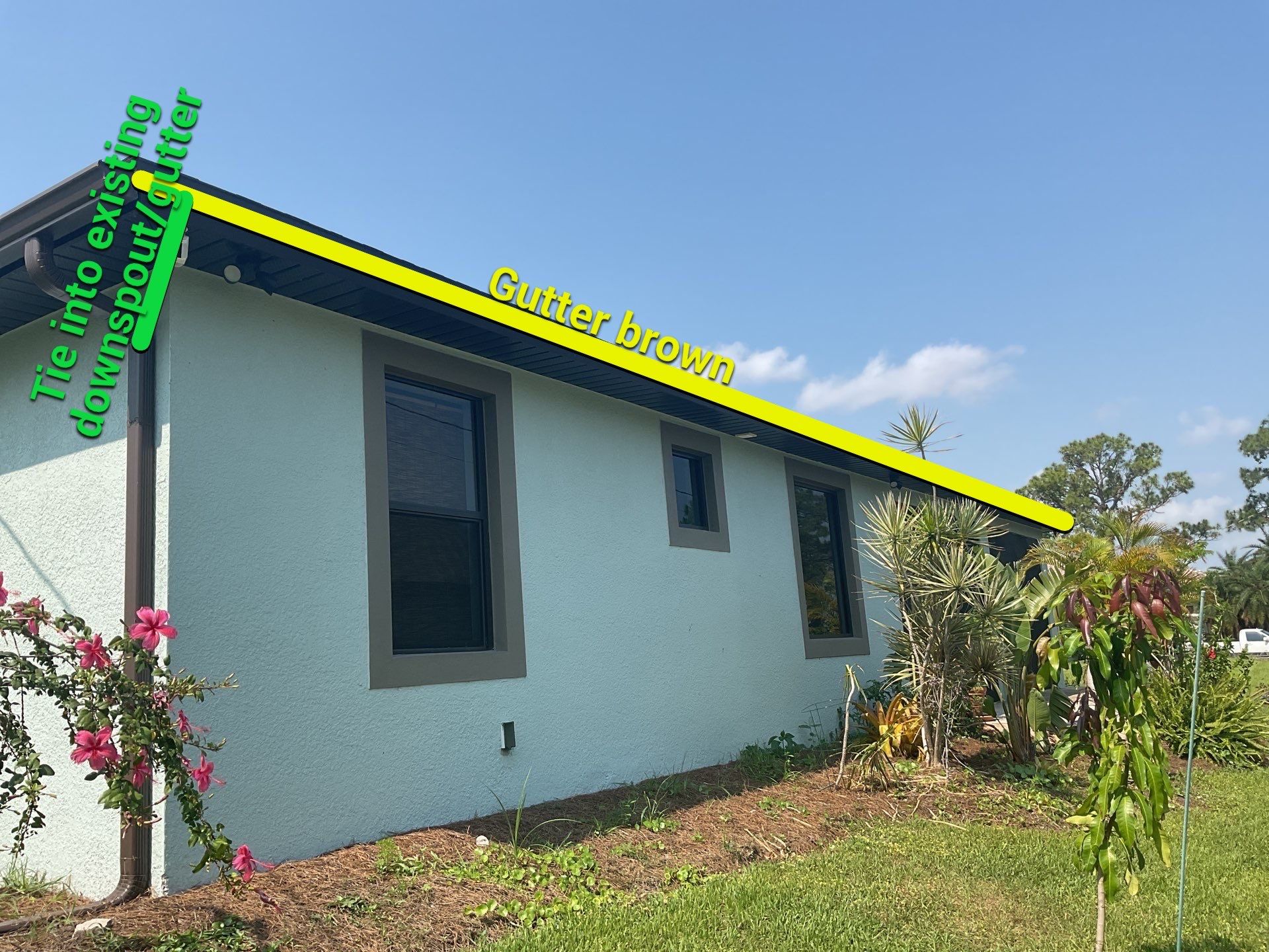 Musket Brown and New Downspouts in Lehigh Acres, FL  by Gutter Professors