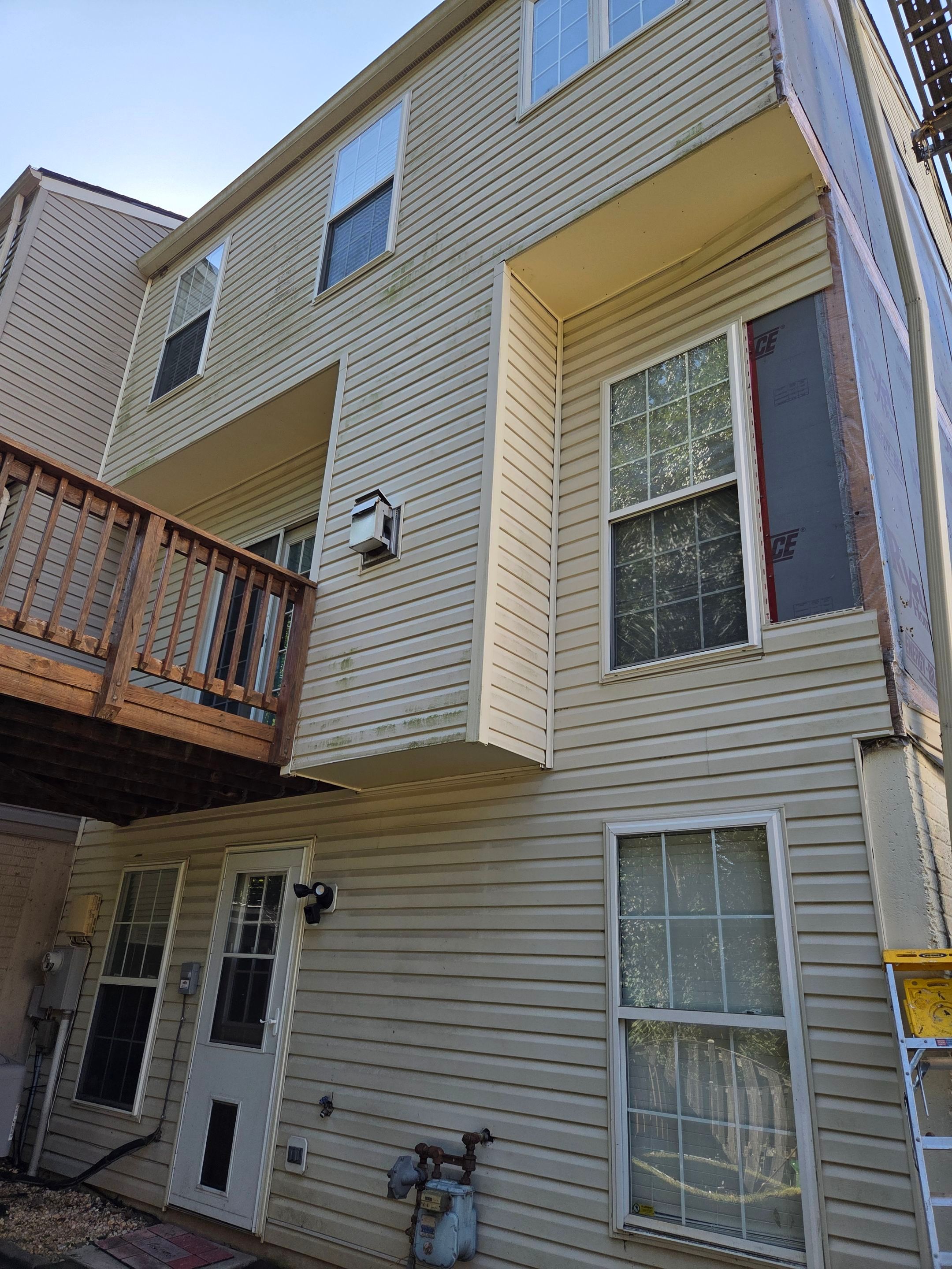 Woodbridge: Siding Replacement with Mastic Ovation Vinyl siding in Linen  by RM Banning, Inc.