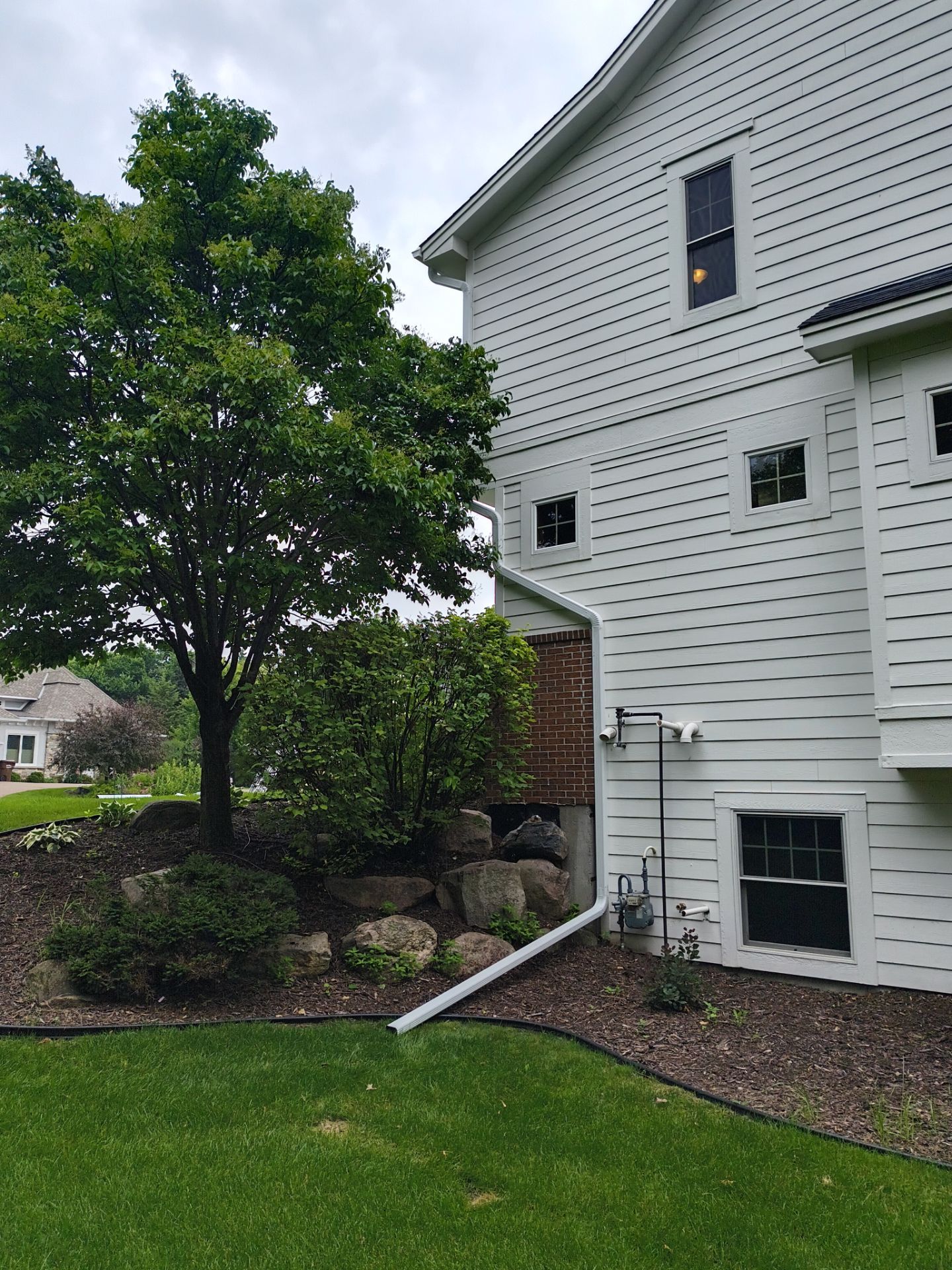 Seamless White Gutter Installation – Long Lake, MN by Next Level Seamless Gutters / Exteriors Inc.