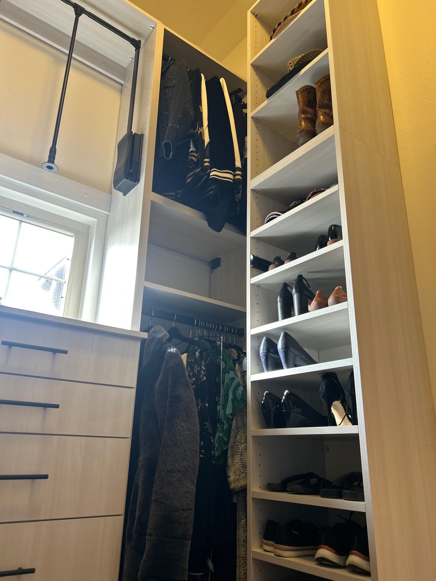 Walk-in Closet in a Small Space by Concept 32, Inc.