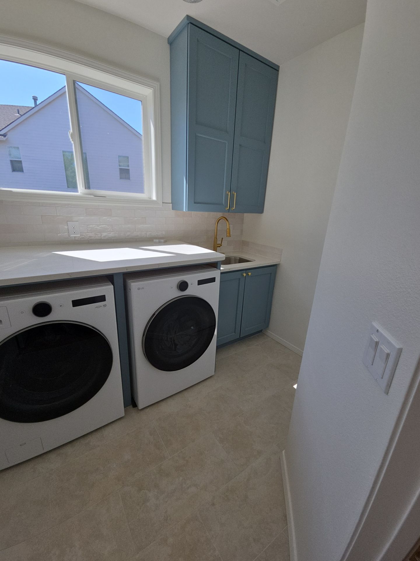 West Linn Laundry Room Renovation with New Cabinetry by American Made Construction 