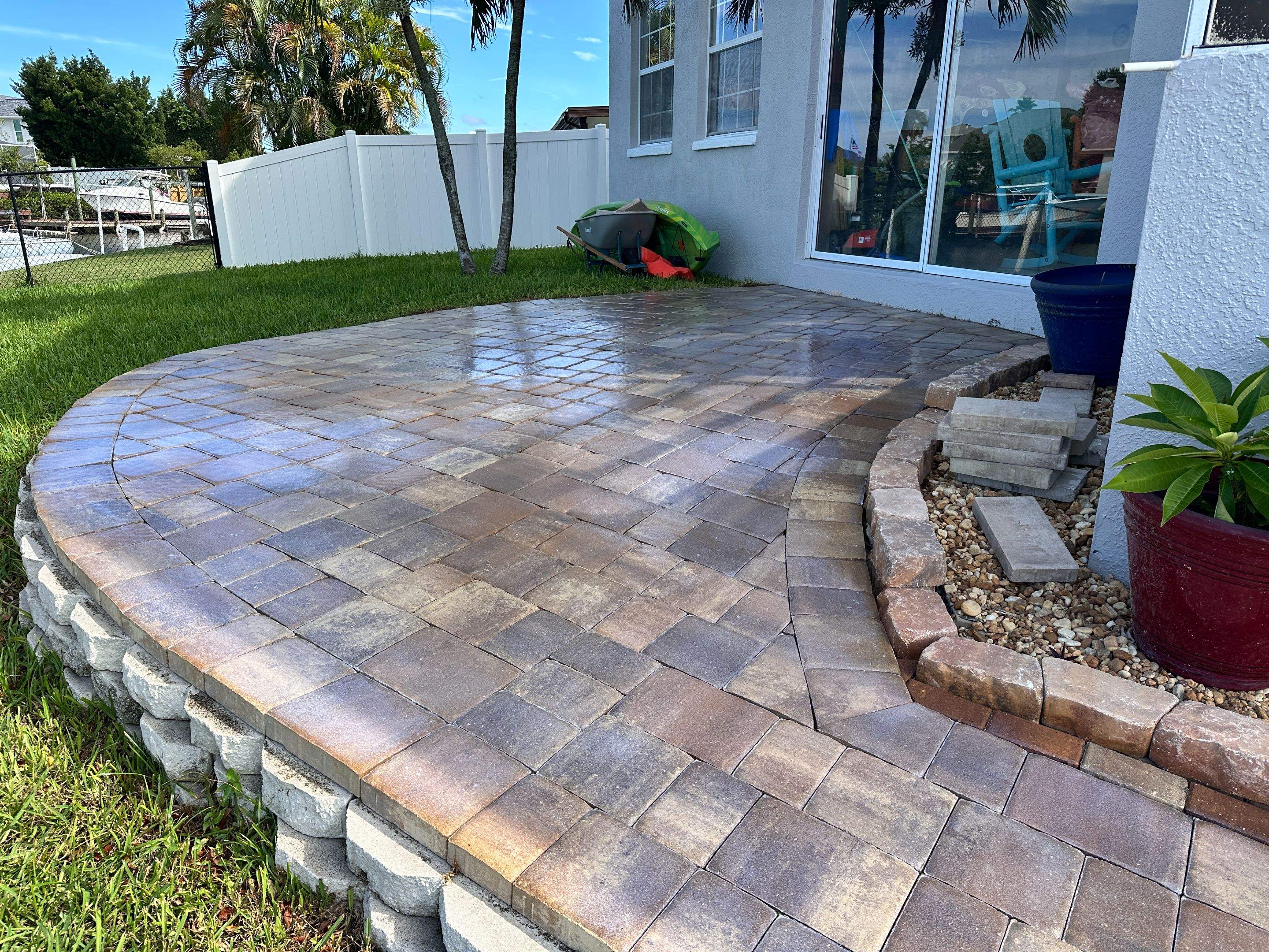 Travertine Sealing and Stripping for a Waterfront Pool Deck in Apollo Beach by Supreme Paver Experts