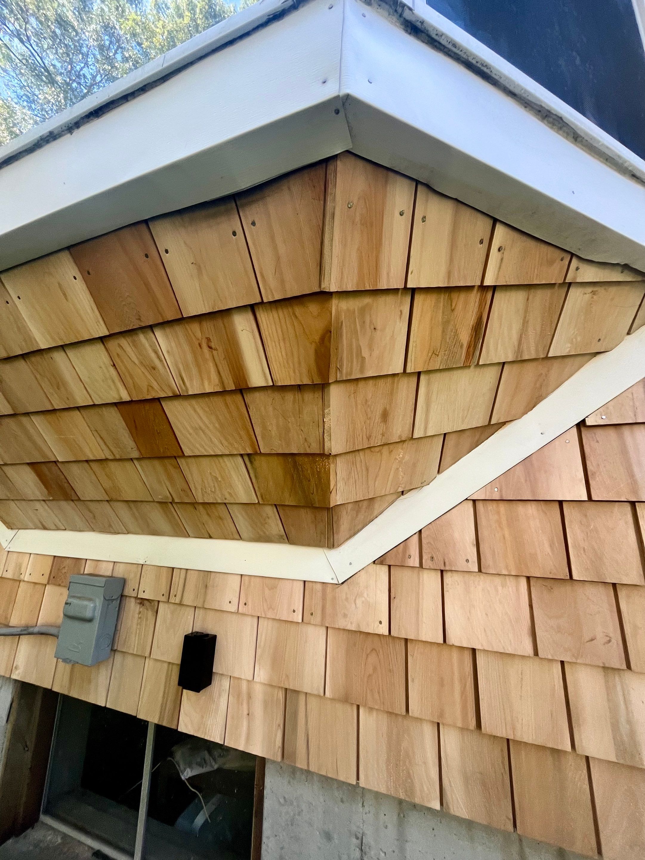 Partial residing project with Red Cedar shingles in Duxbury, MA by UBrothers Construction