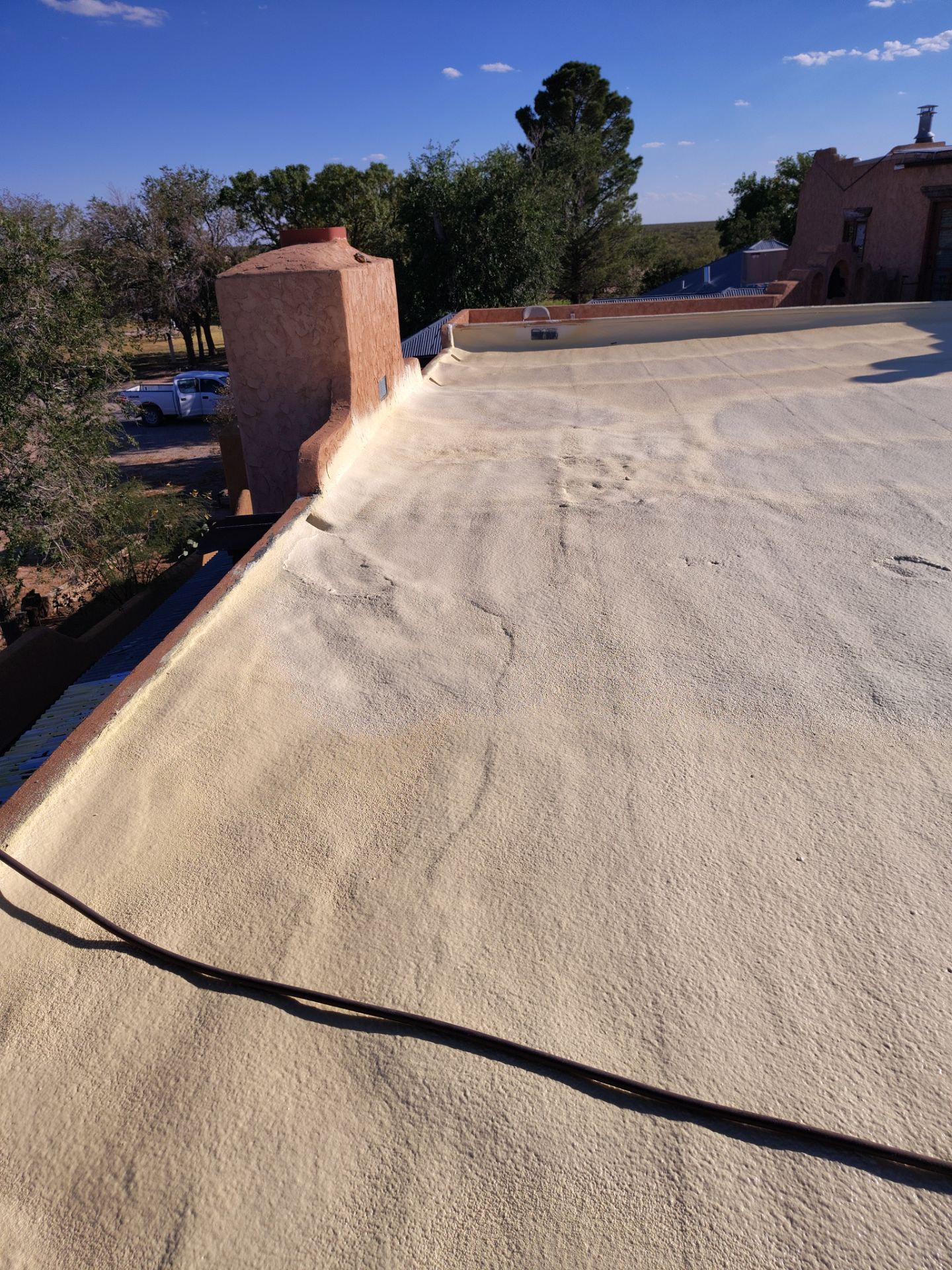 Residential roof application by SPF Services 