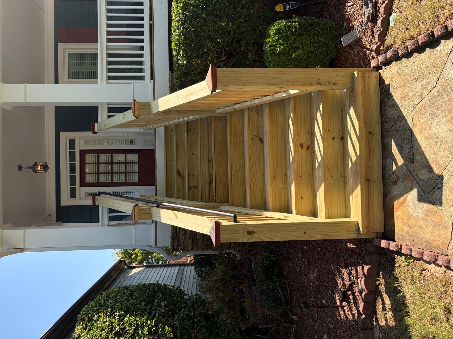 Atlanta Exterior Home Refresh with Blue Siding and Deck Staining by Swift Home Renovations 