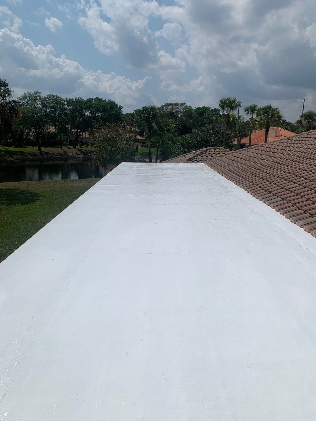 100% Silicone Roof Coating Repair using Tropical #924 Silicone Roof Coating by Morton Roofing, Inc.