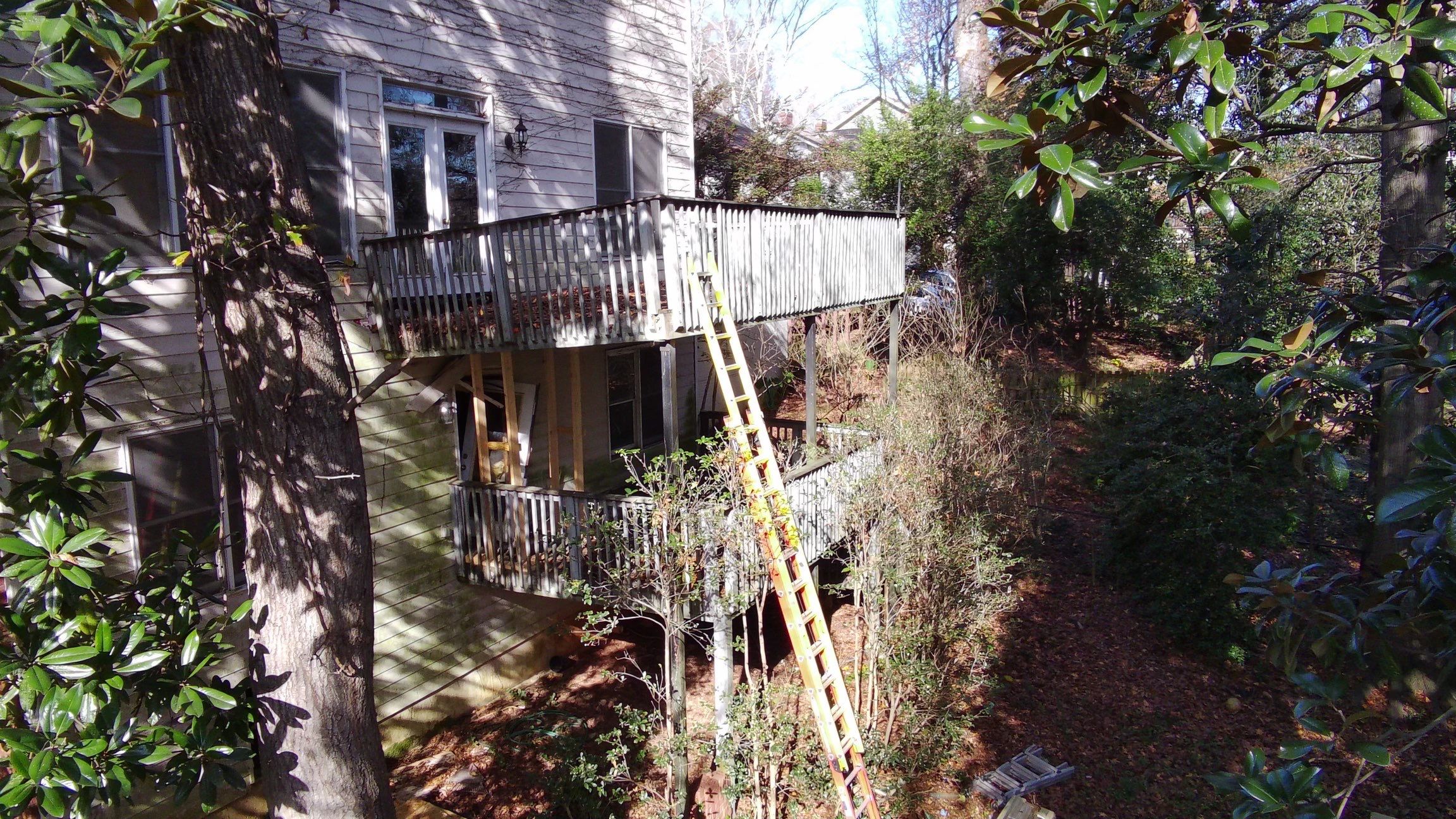 Multi-Level Pressure-Treated Wooden Deck Construction in Decatur by Swift Home Renovations