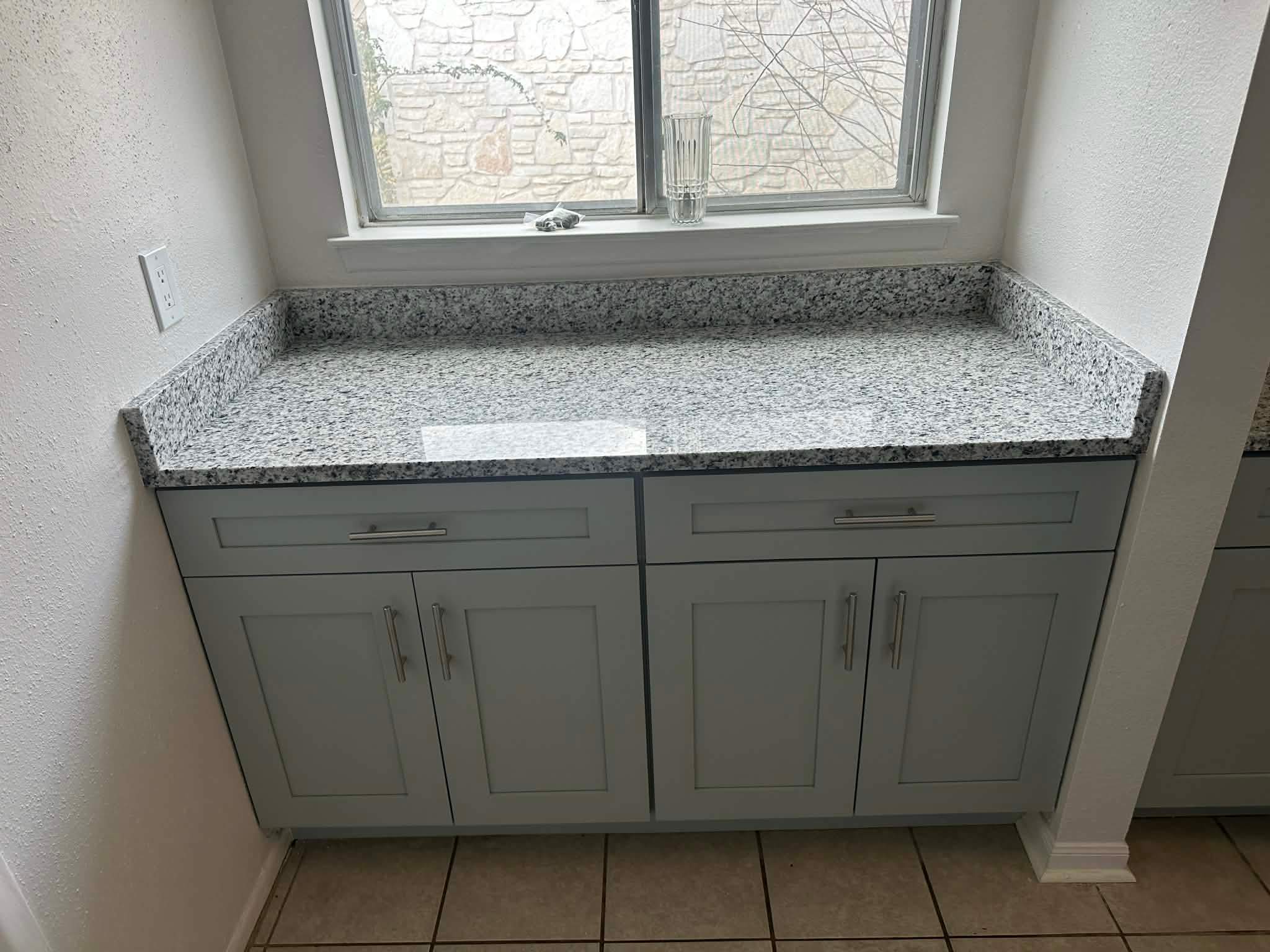 Kitchen Remodel and Water Damage Restoration in San Antonio by Mena stone surfaces
