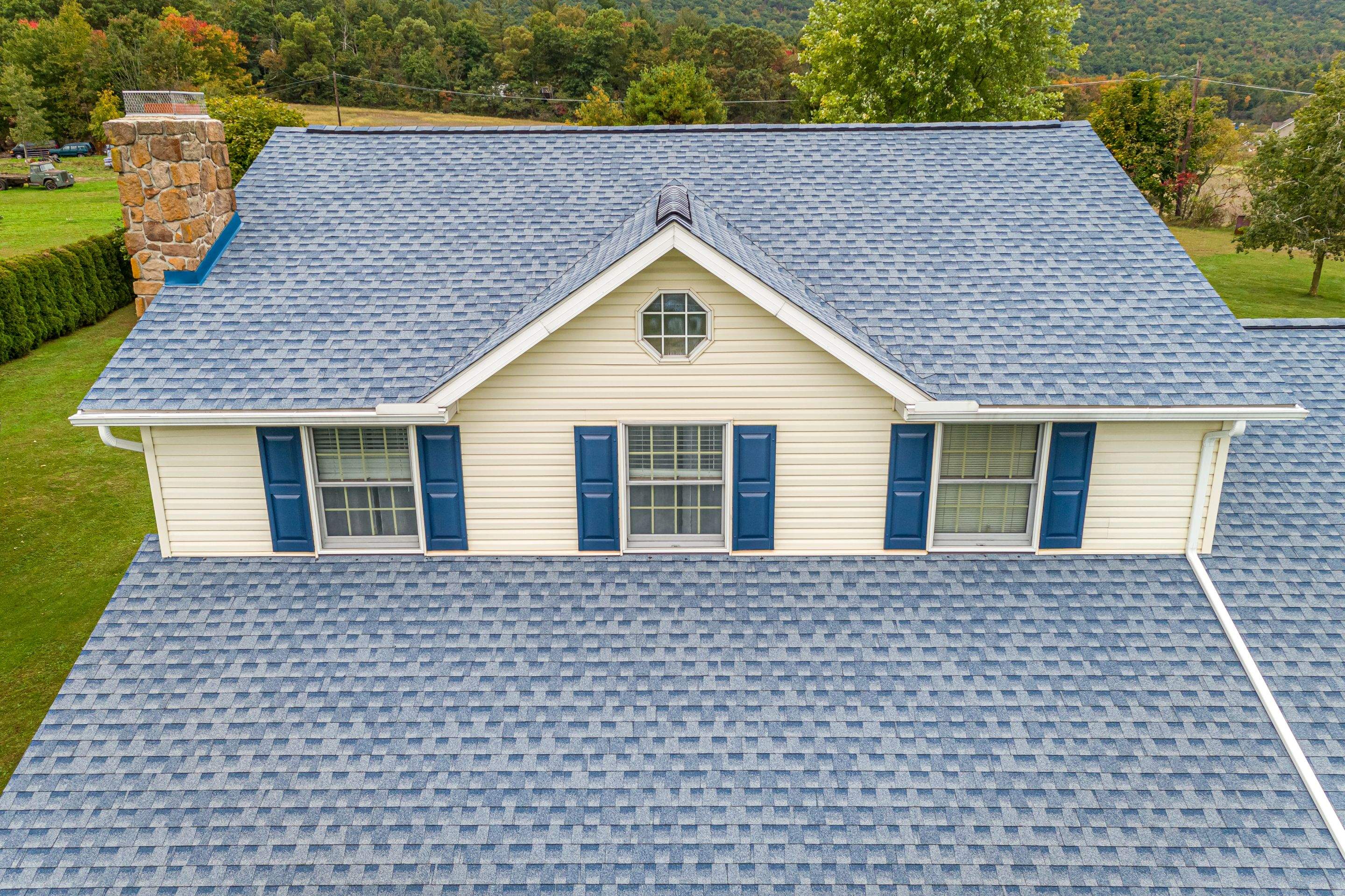 Shingle Roof-Biscayne Blue- and windows by Esh Builders