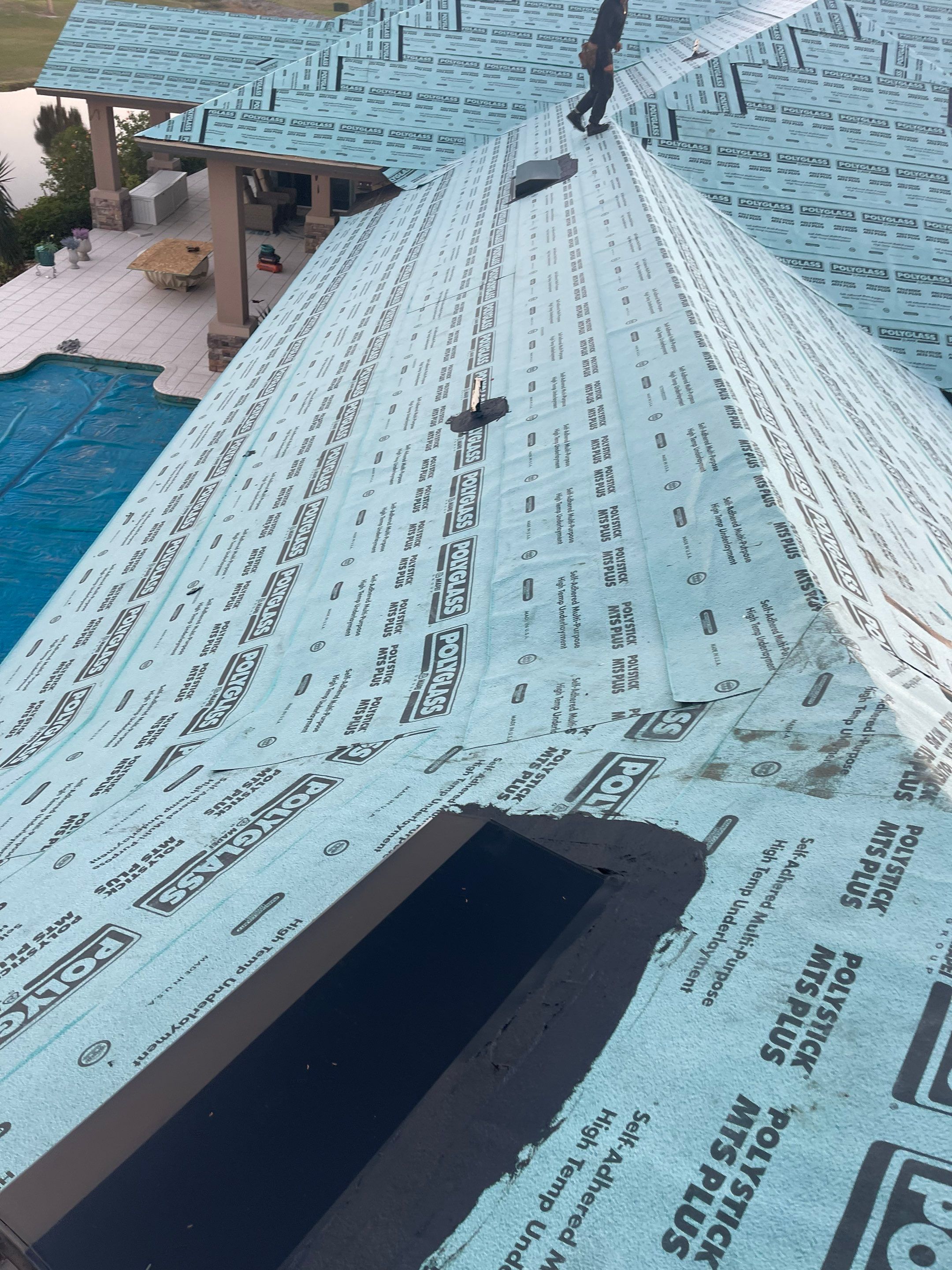 Residential Roofing Installation using Standing Seam Metal Roof in Cape Coral, FL by International Roofing