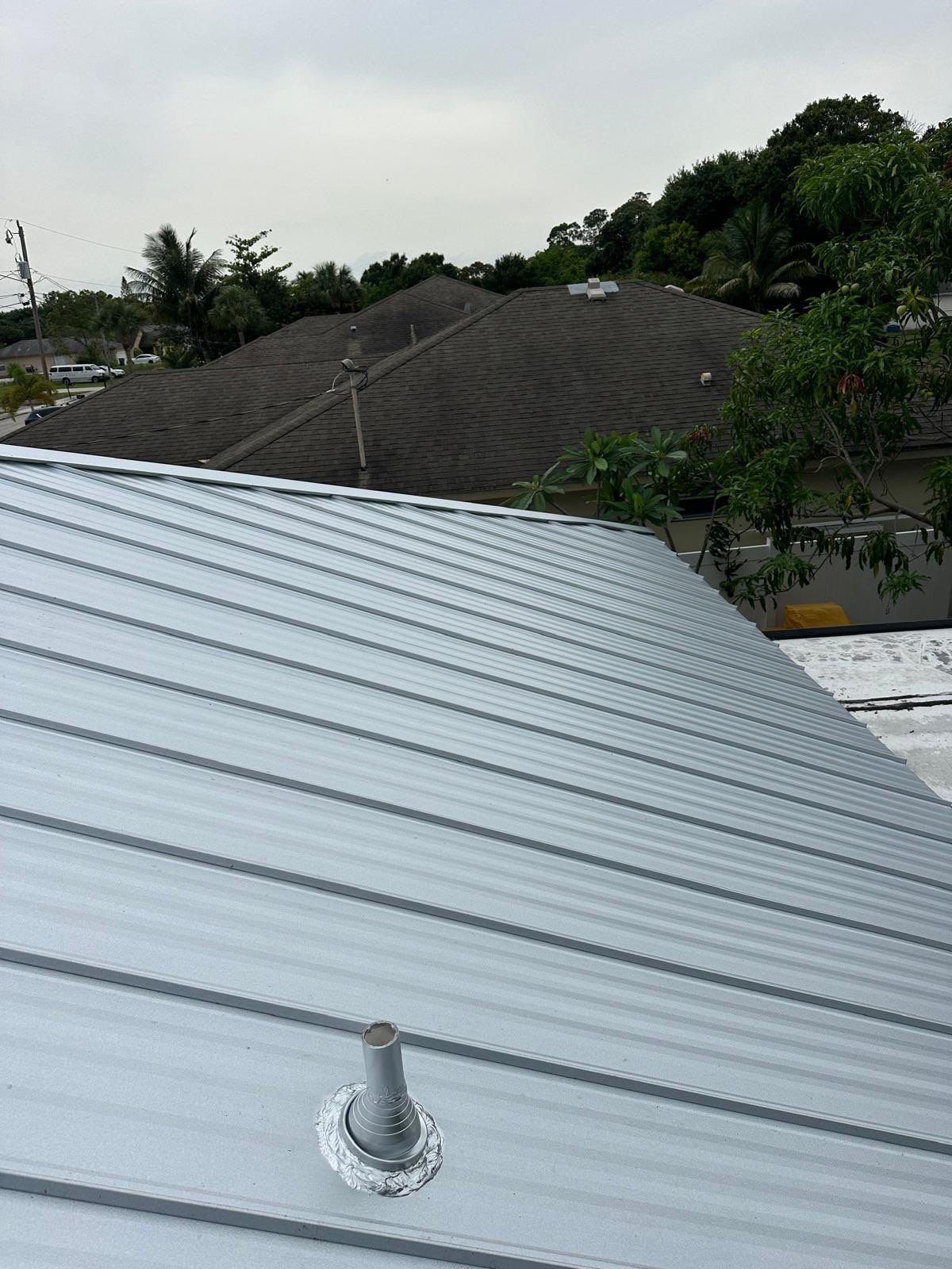 Residential Roofing Installation using 1" Nail strip metal roof by BLUES BROTHERS ROOFING