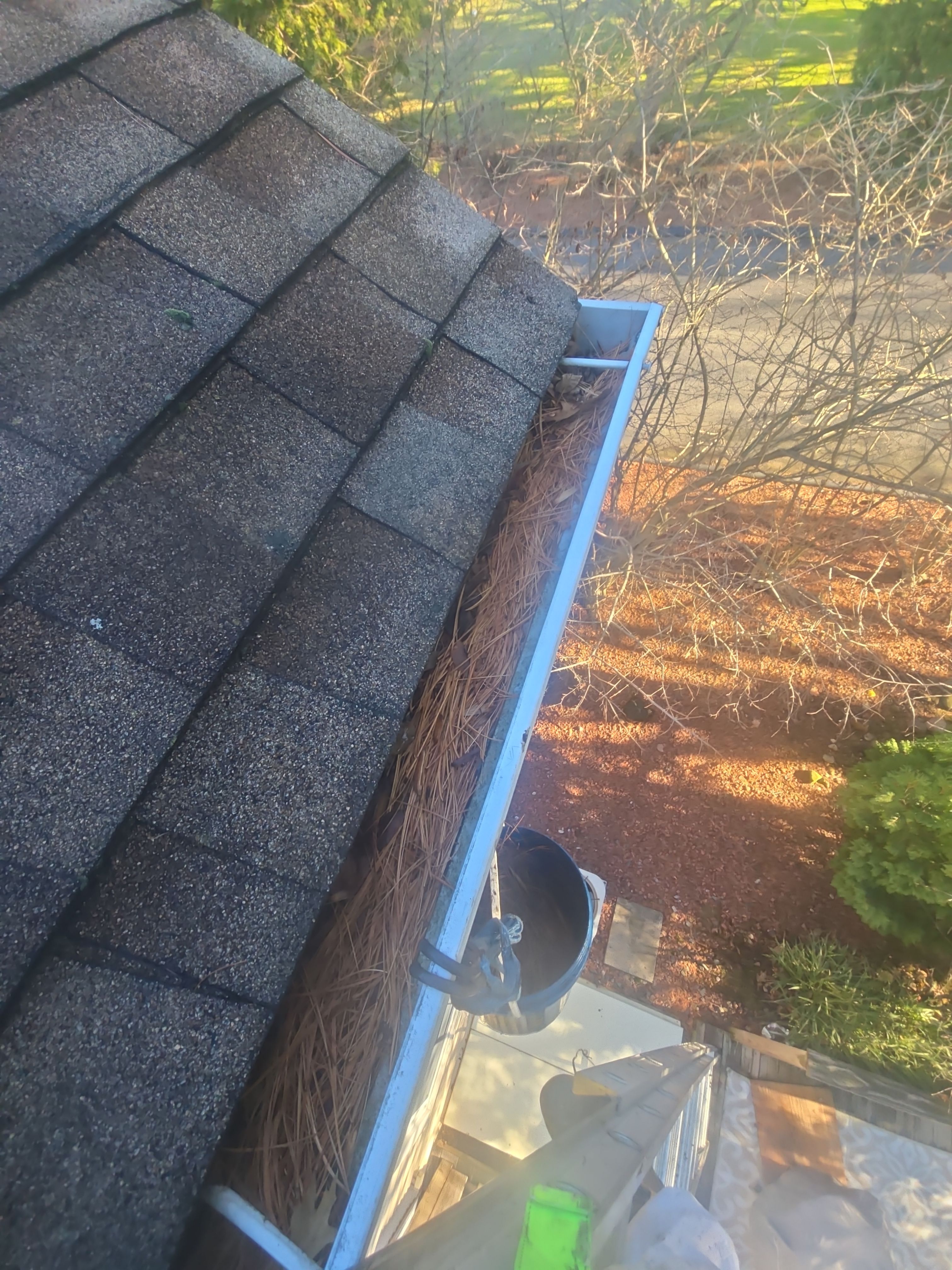 Commercial gutter cleaning Hartford, CT before photo with filled gutters