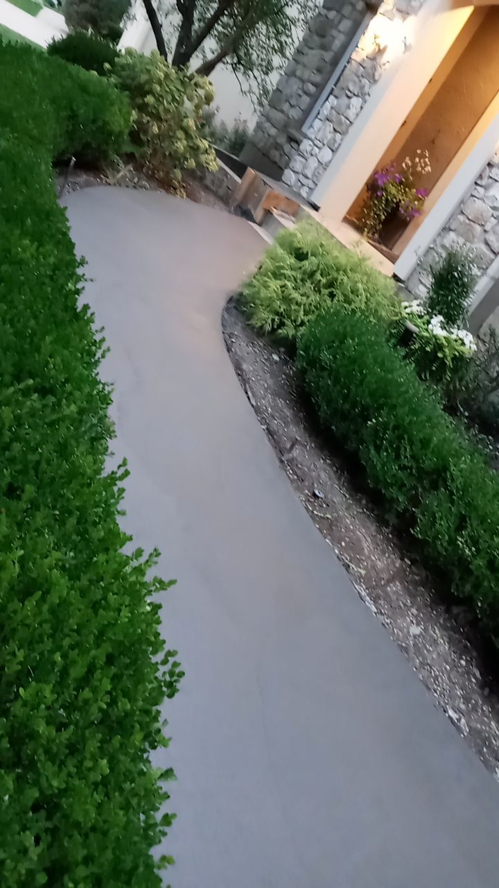 New Driveway and Sidewalk by LAND ESCAPES LLC