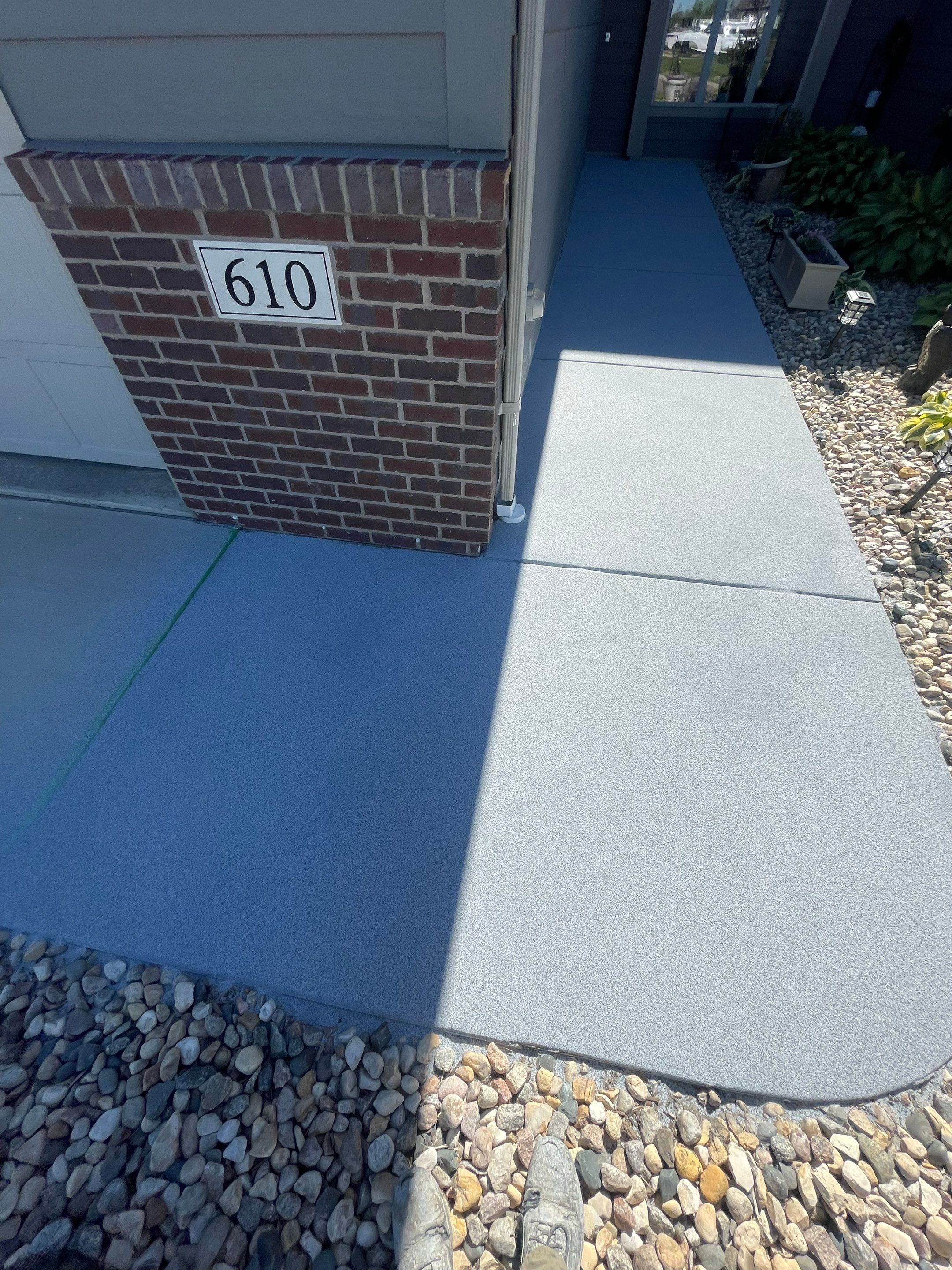Custom Concrete Coating for Sioux Falls Patio and Front Walkway by Select Painting, Coatings & Garage Cabinets