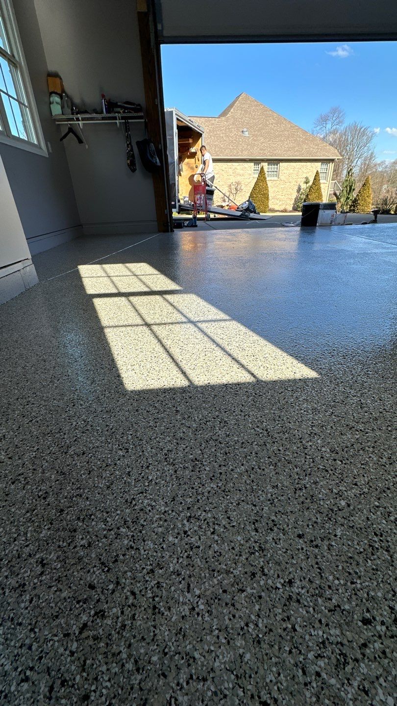 Driveway + Garage + Walkway Project in Meridian by Floors in a Day, Inc