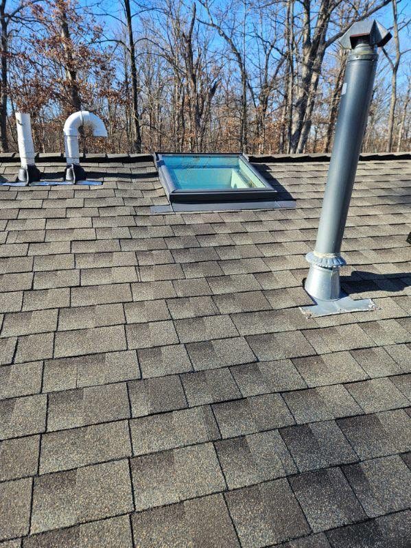 Asphalt Roof Replacement by Custom Installations