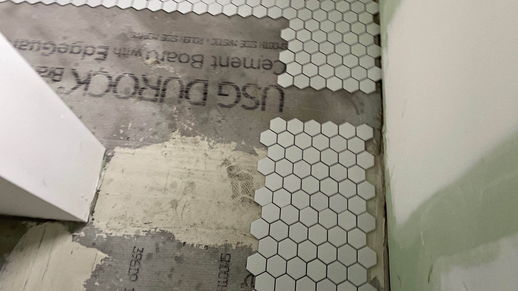 Remodeled Home with new tile floors, Showers and Refinished Oak Floors with stain and Waterbased Finish by Footprints Floors of Coastal Carolina