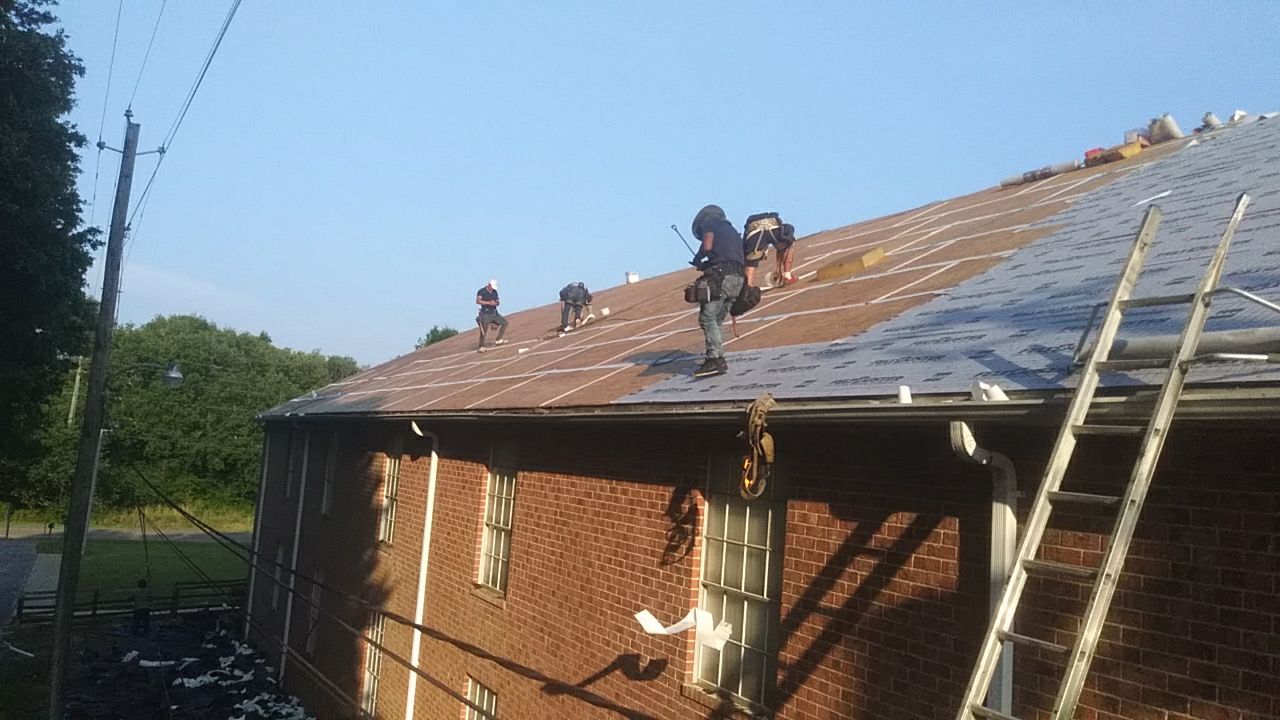 Residential Roofing Installation using Roof Replacement by American Roofing & Construction LLC