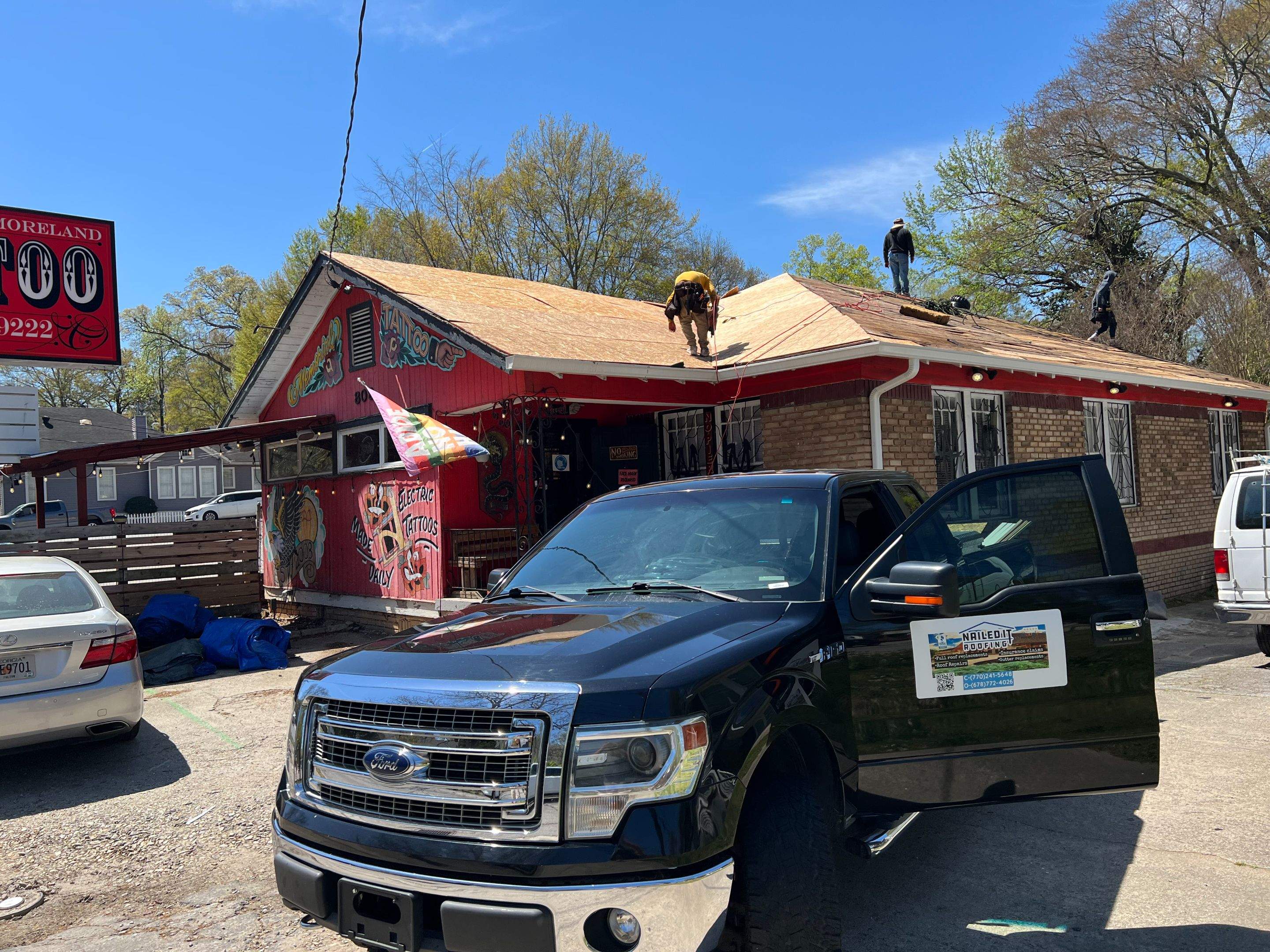 memorial tattoo roof & gutter replacement by Nailed It Roofing & Remodeling LLC