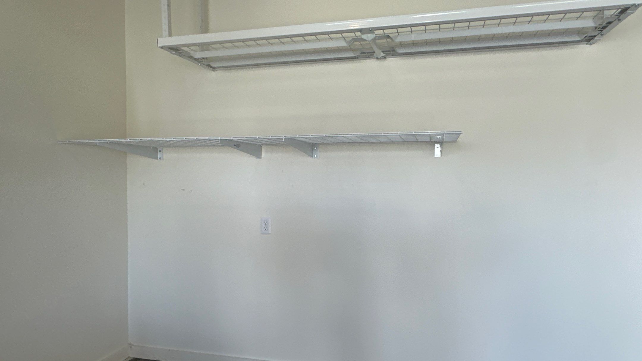 Brad V. had Slotwall and overhead racks added to his garage  by Banner Garage