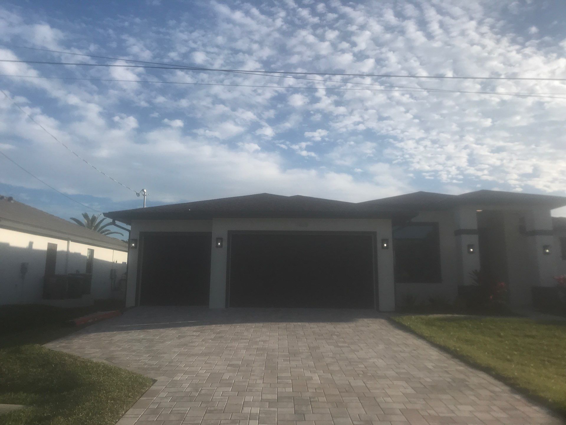 Seamless Gutter Installation using Musket Brown Seamless Gutters in Cape Coral FL by Gutter Professors