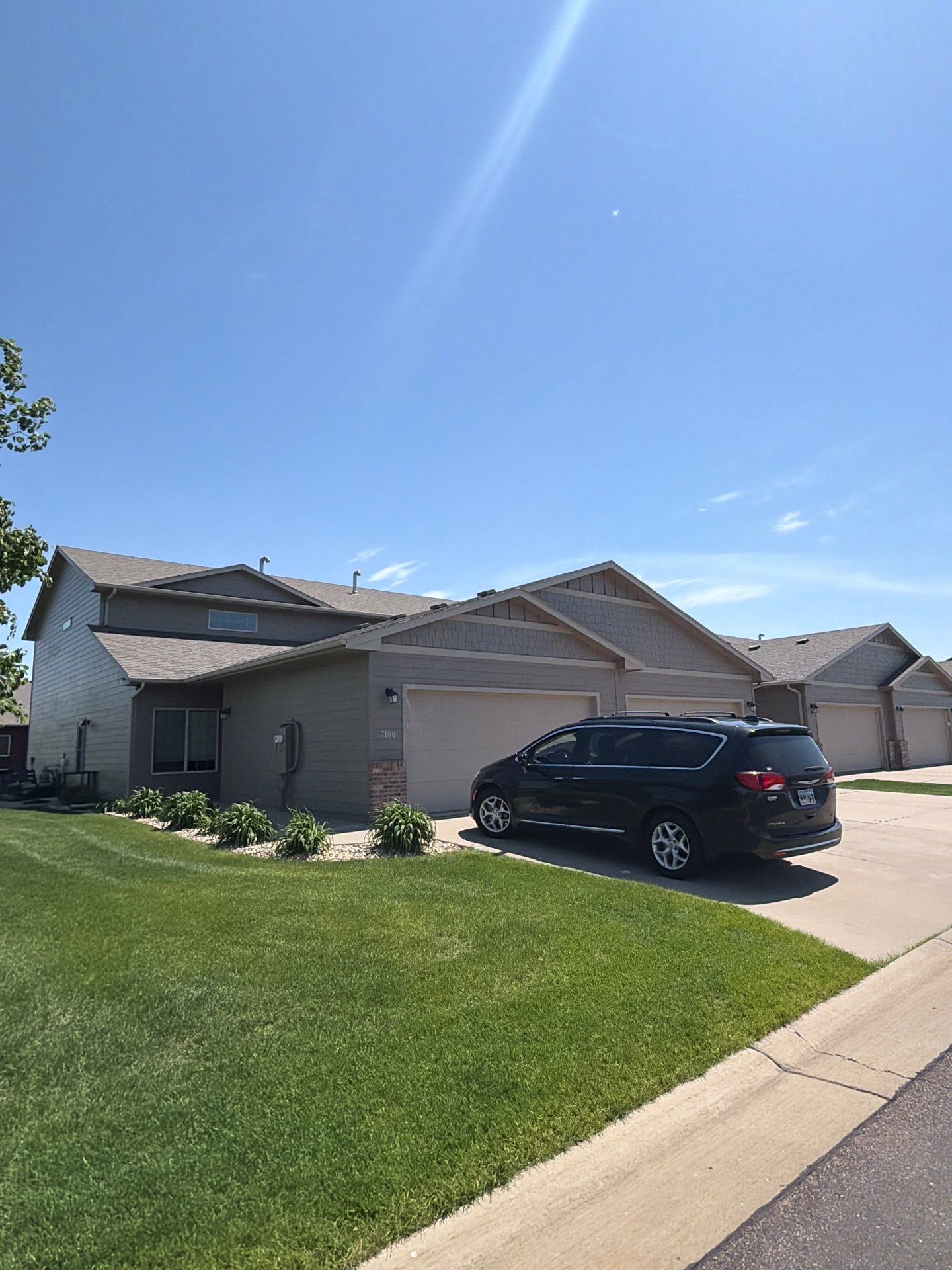 Multi-Family Exterior Painting and Trim Refresh in Sioux Falls by Select Painting, Coatings & Garage Cabinets