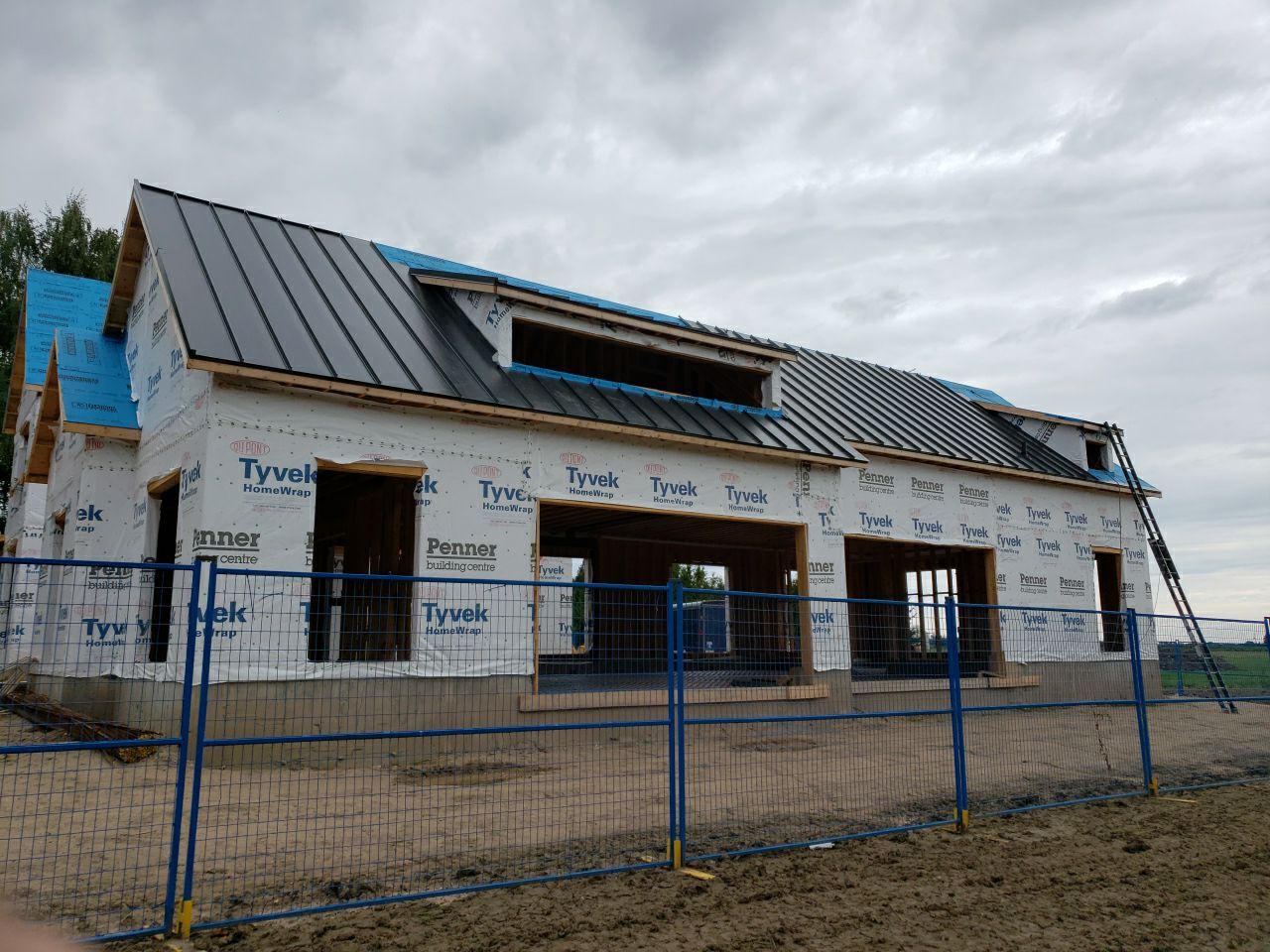 New Home Construction using 16" Standing Seam Panels by Jay Carter Roofing & Sheet Metal