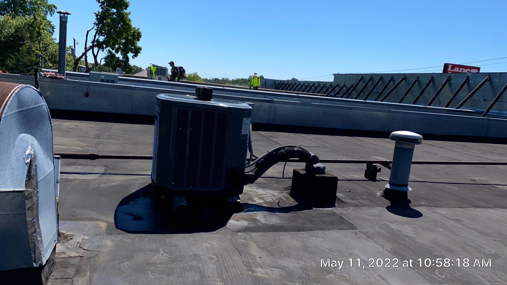Commercial Roof Coating using Fiberseal basecoat and Silicon Topcoat by Just In Time Roofing and Restoration