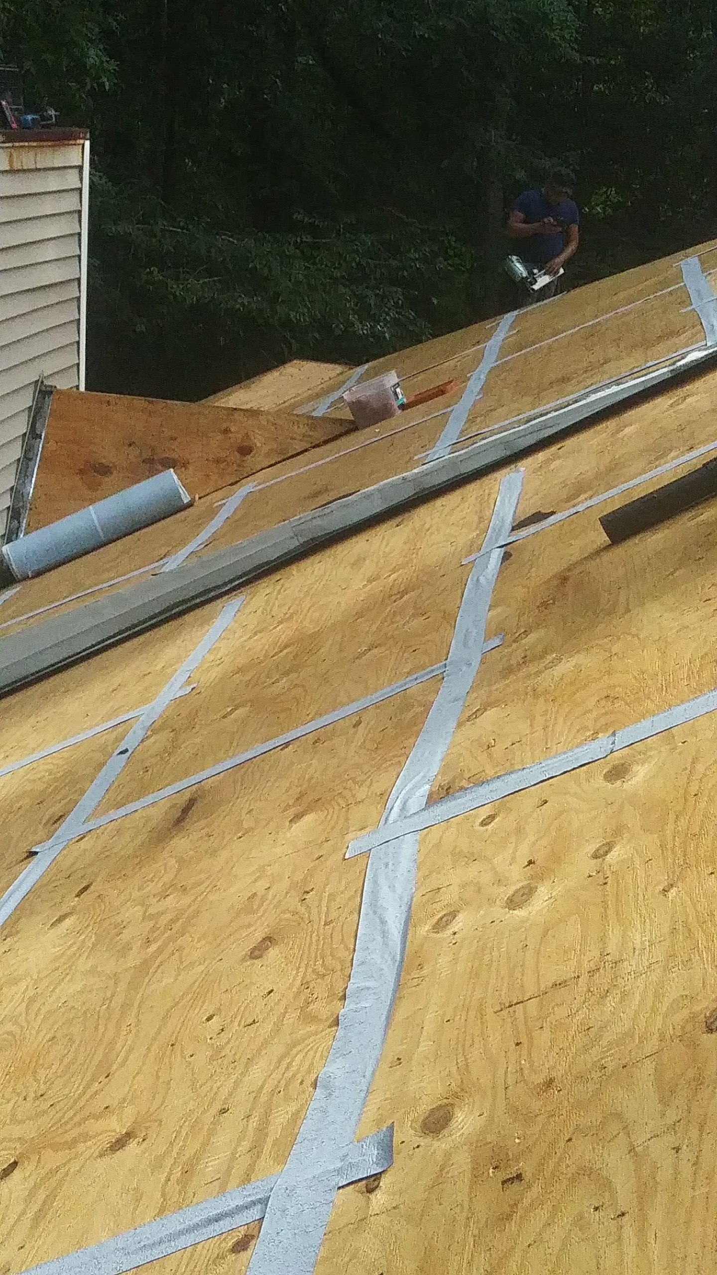 Residential Roofing Installation using Roof Replacement by American Roofing & Construction LLC