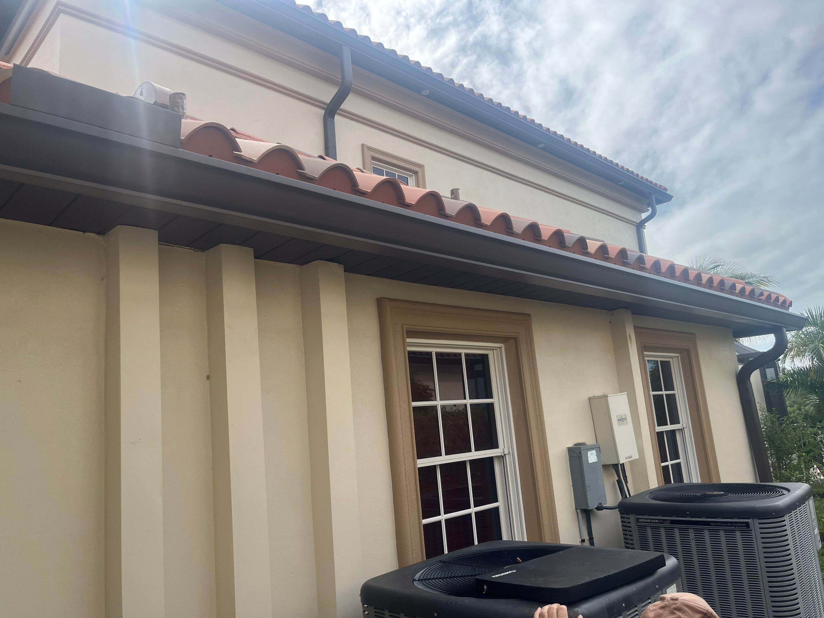 Musket Brown Seamless Gutters using Musket Brown Seamless Gutters in Cape Coral FL by Gutter Professors