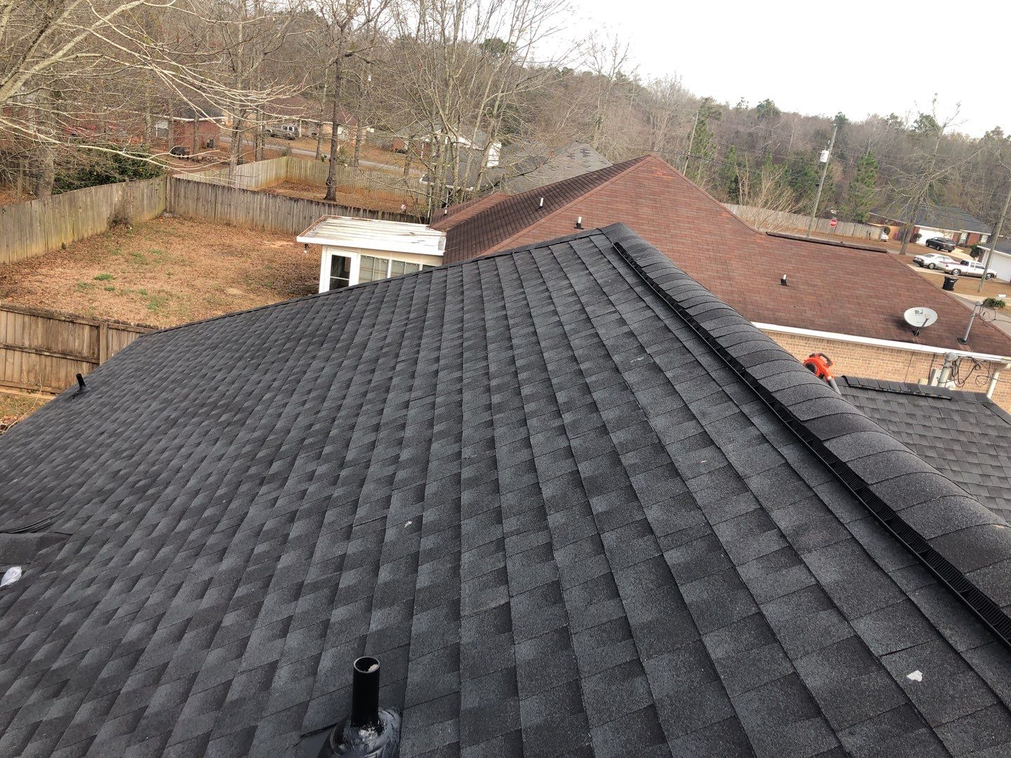 Residential Roofing Installation using Roof Replacement by American Roofing & Construction LLC