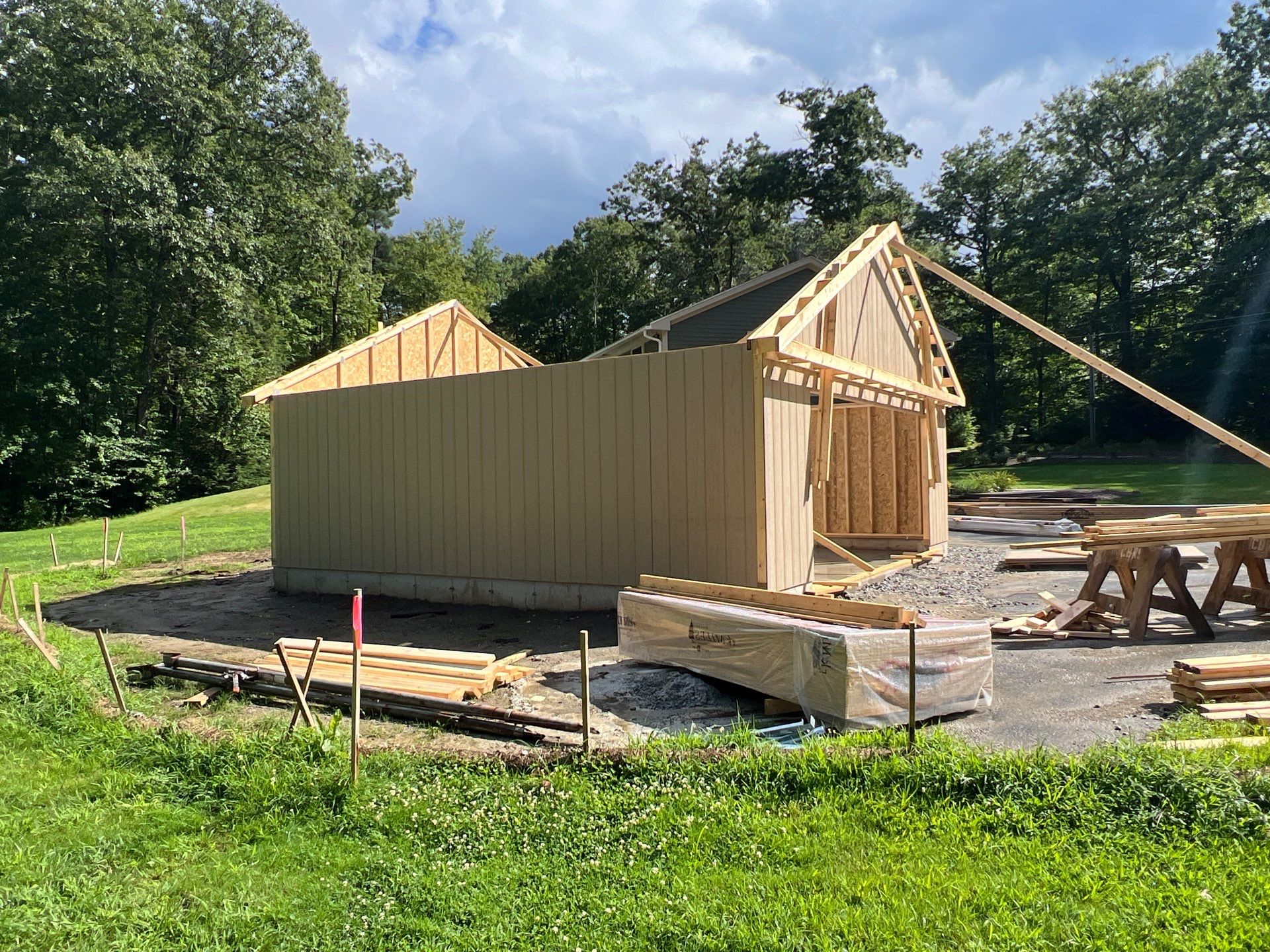 Two-Car Garage using LP SmartSide Panel Siding by Chagnon Building & Remodeling LLC
