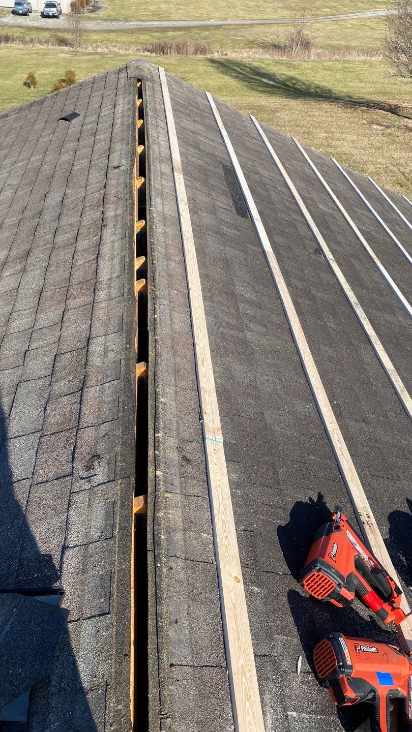 Residential Roofing Installation using Performance Panel Metal - Frost Black by RoofX 