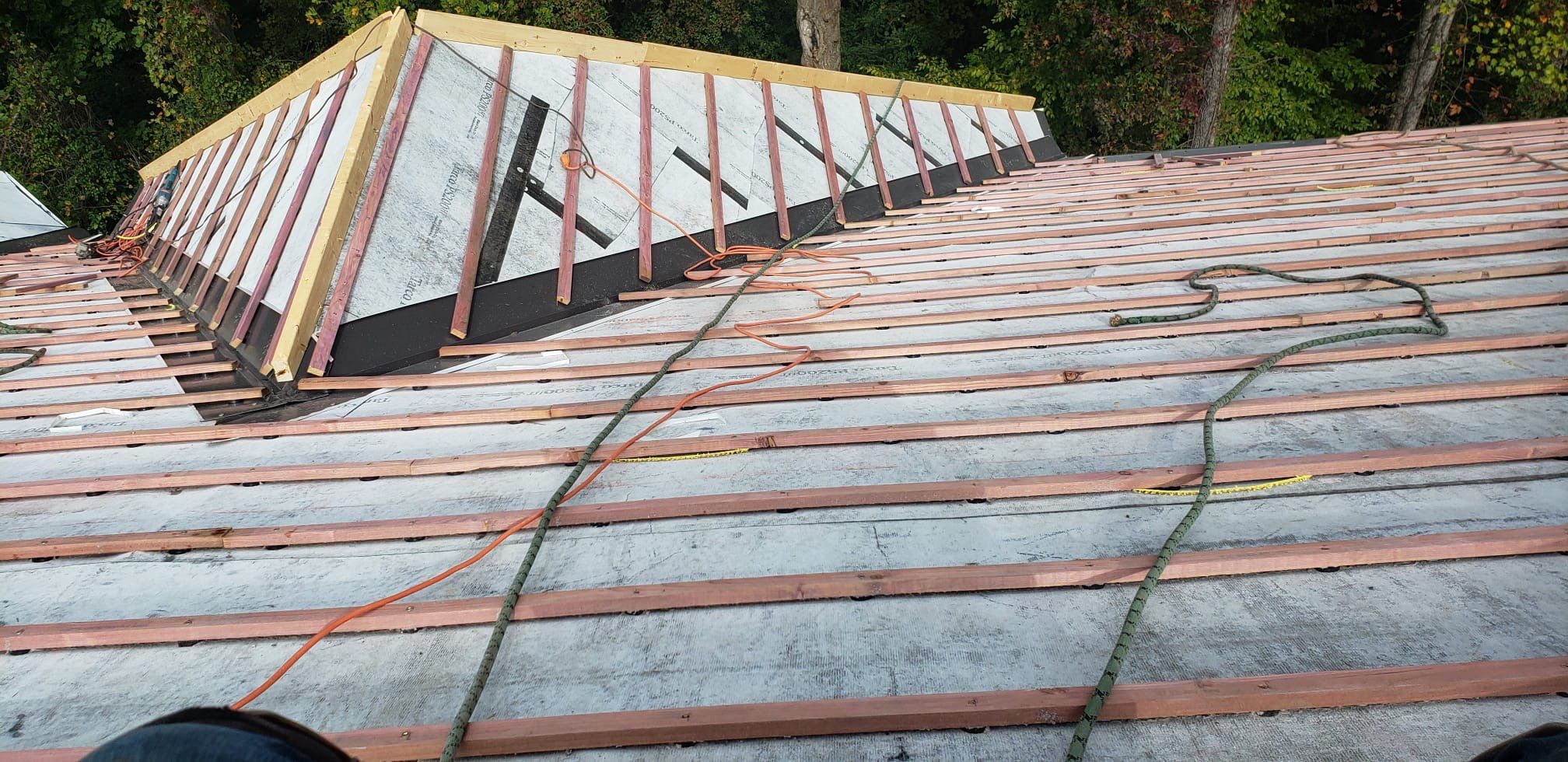 Residential Roof Replacement using Vermont Slate by Mosaic Roofing Company