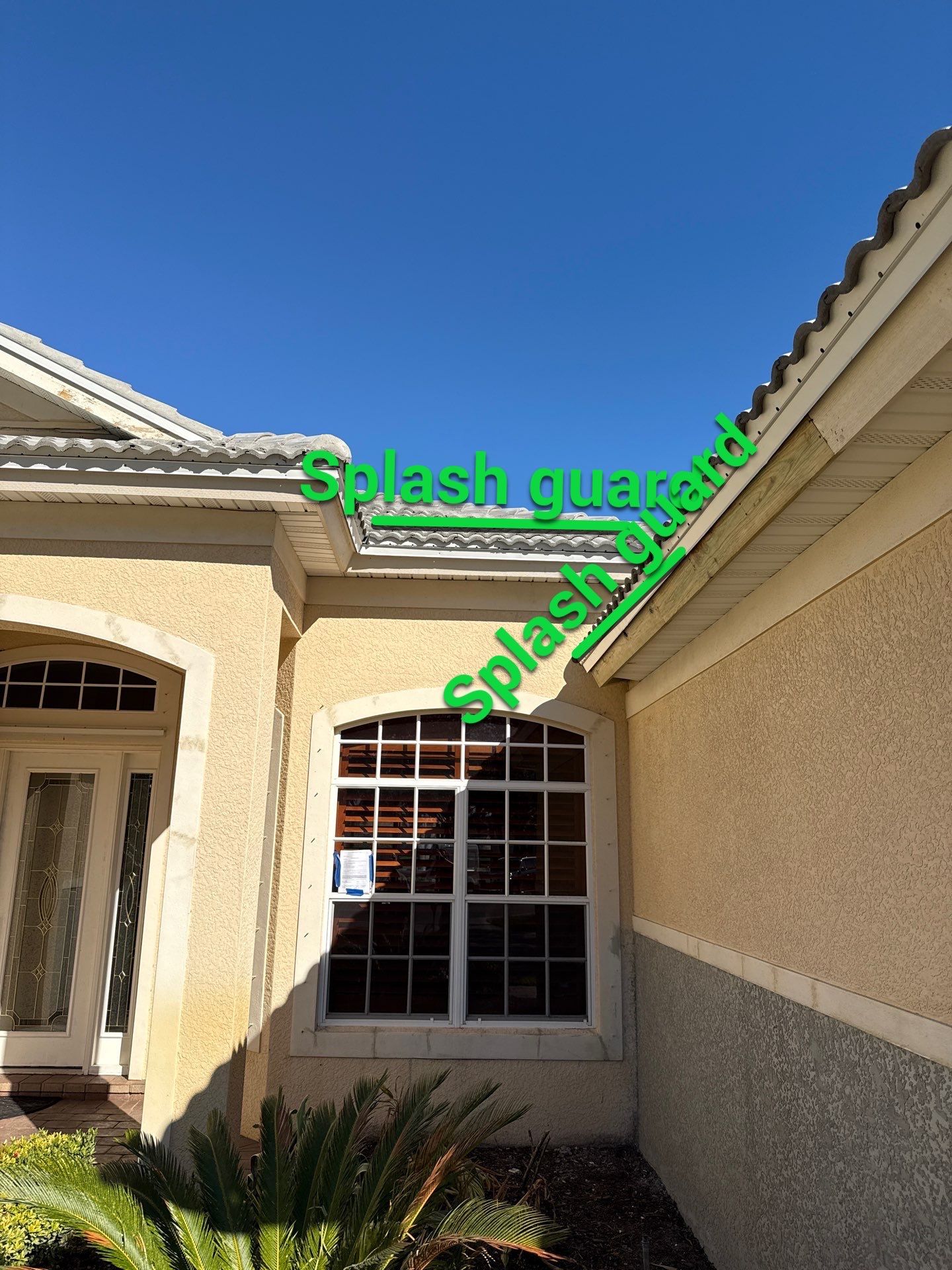 6-inch K-style Seamless Gutters and Splash Guard in Grey Color in Naples FL by Gutter Professors