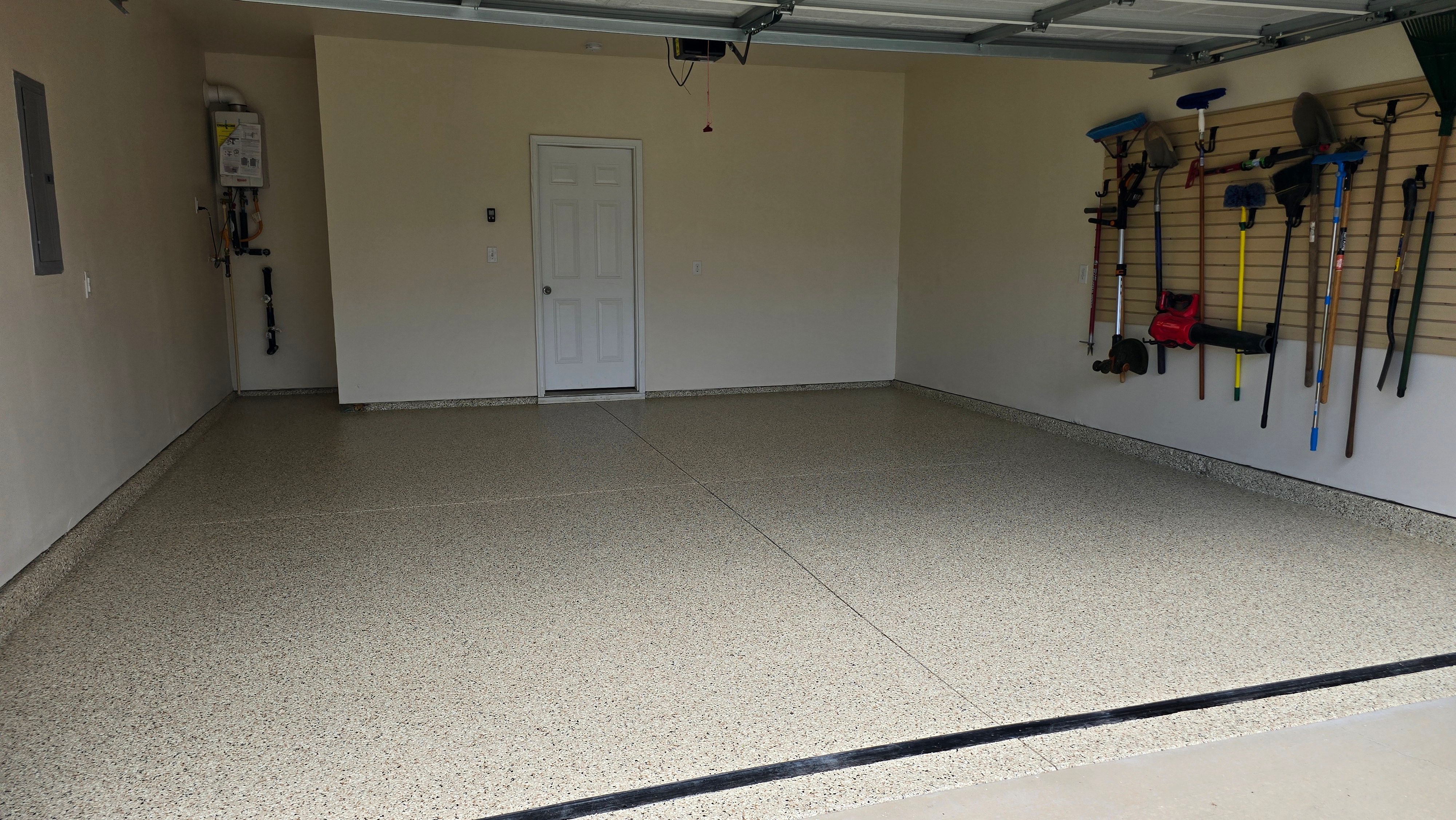 Garage & Back Porch Using Shoreline & Coyote by Elite Floor Solutions