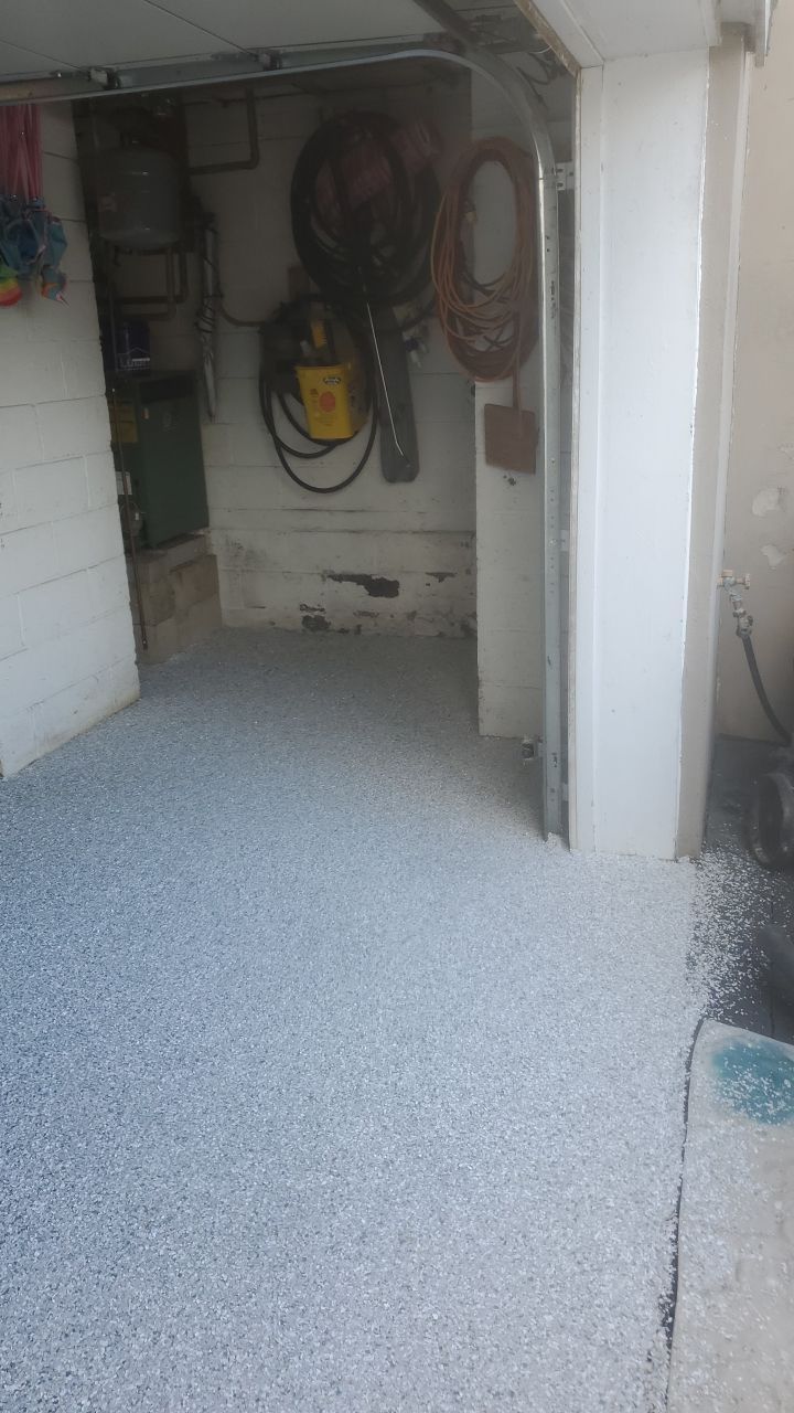 Garage Floor In Mt. Everest by Spectrum Painting, LLC