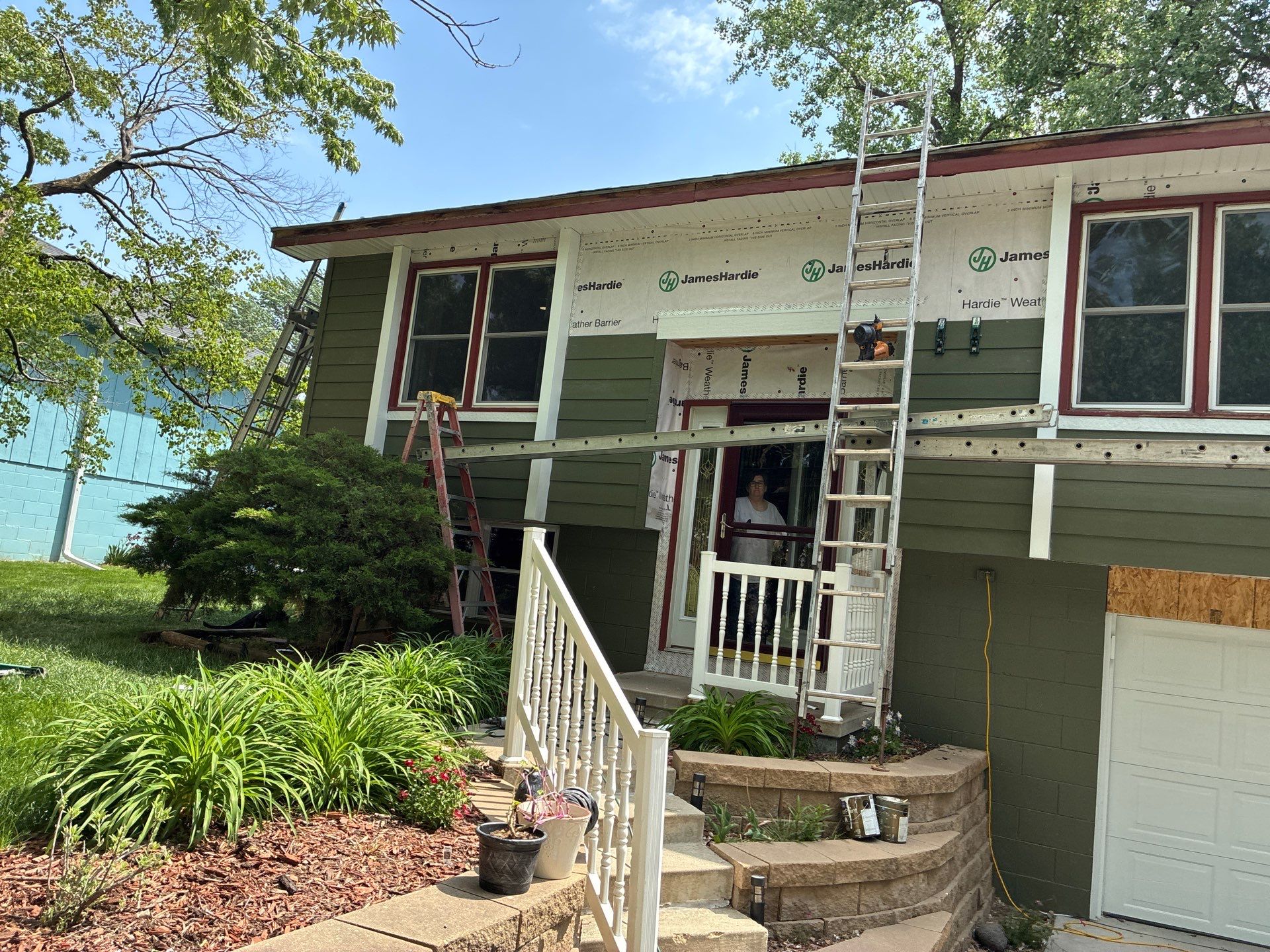 James Hardie Siding Replacement in Omaha with Mountain Sage Finish by Carps Complete Exteriors