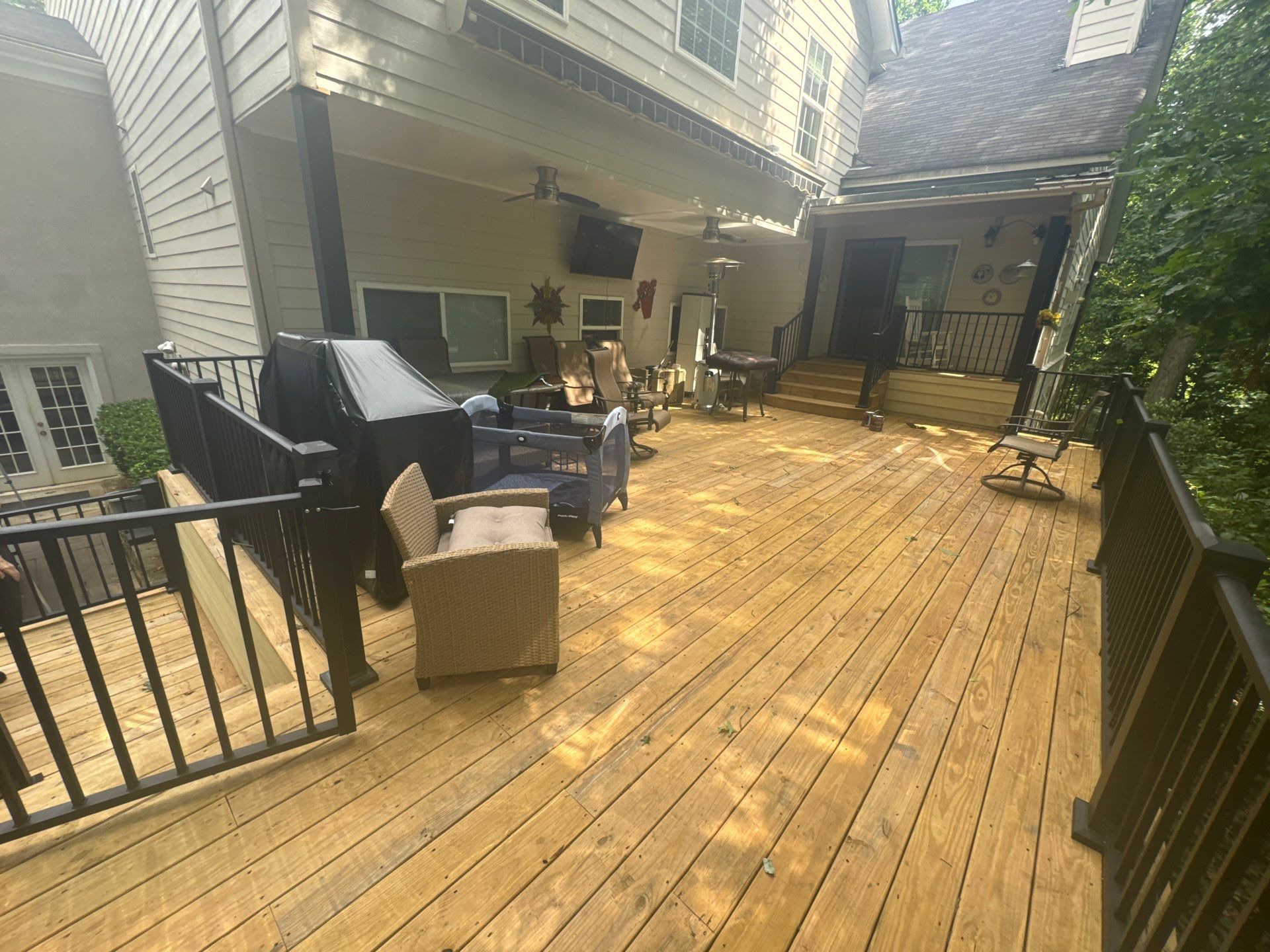 Multi-Level Wood Deck Staining and Restoration in Atlanta by Swift Home Renovations