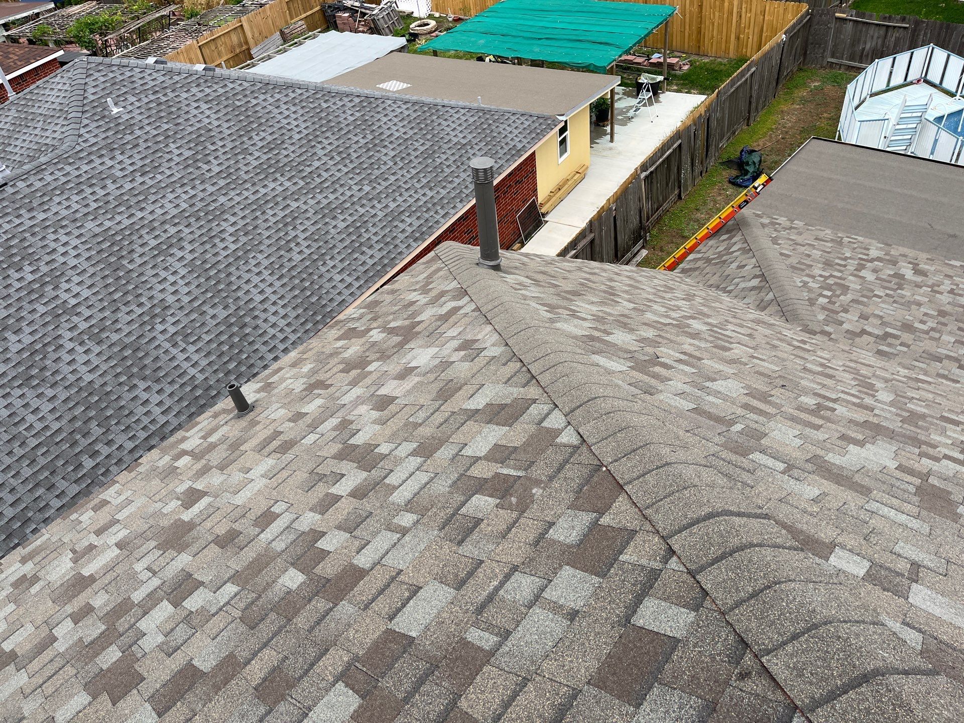 Residential Roofing Installation using Owen's Corning Duration (Lifetime) Shingles by Roof Repair Company