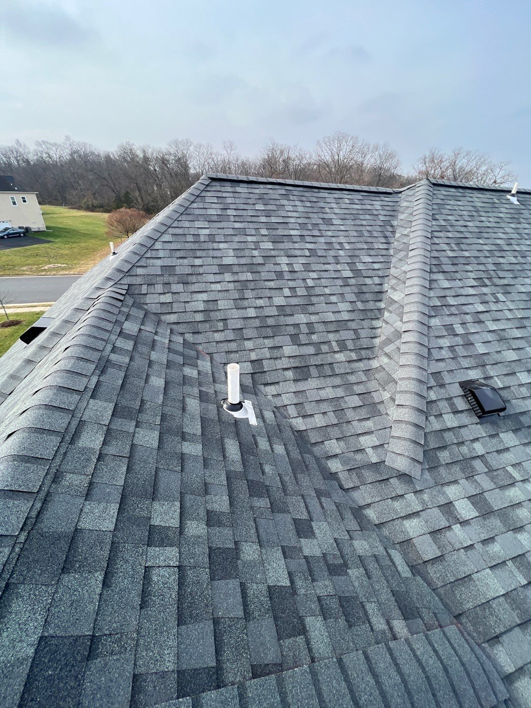 Estate Gray Shingles by Reimagine Roofing